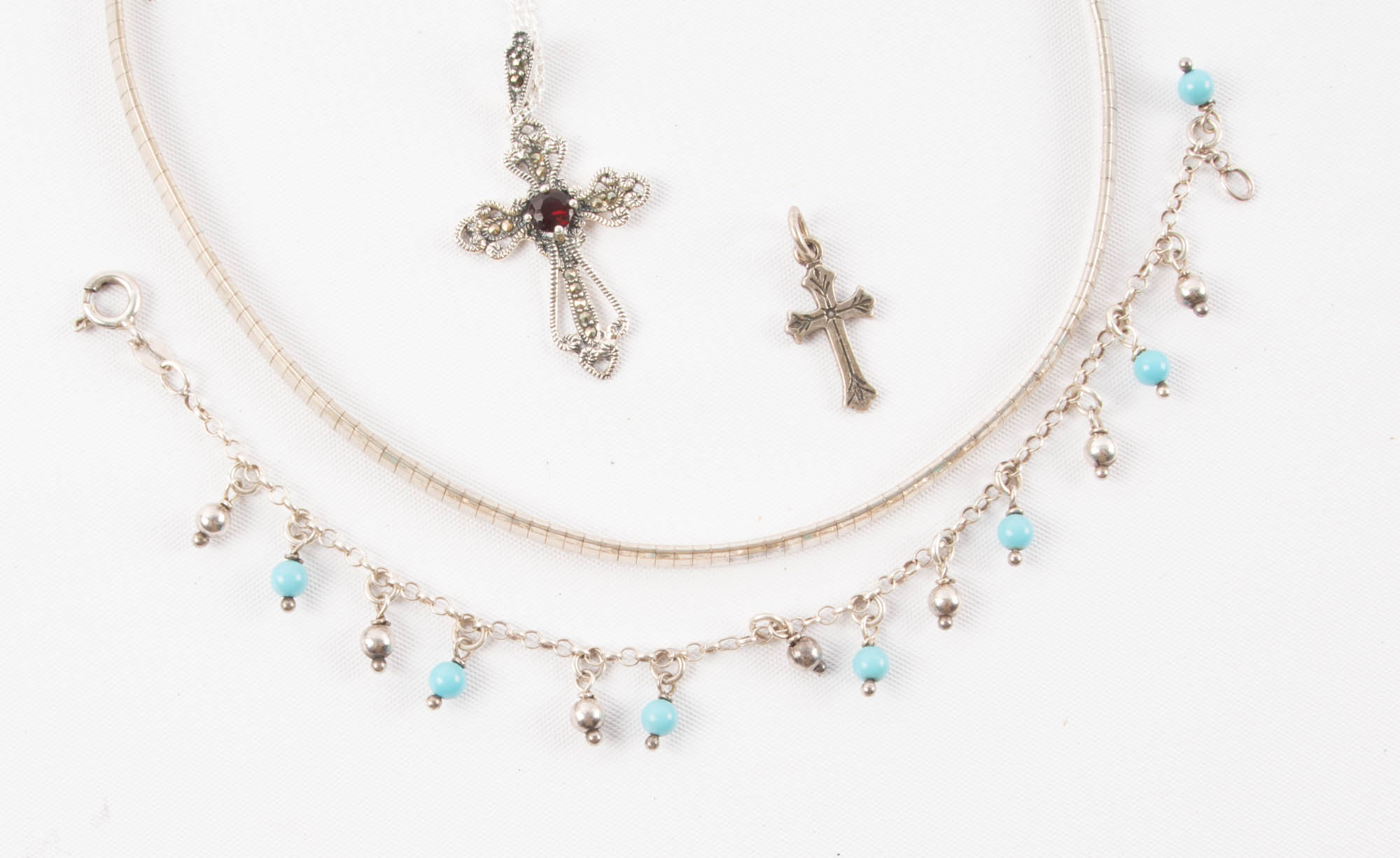 Pair of Sterling Silver Pendants and a Turquoise Bracelet
