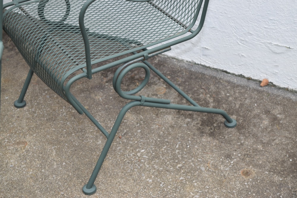 Wrought Iron Patio Table and Four Wrought Iron Rocking Chairs