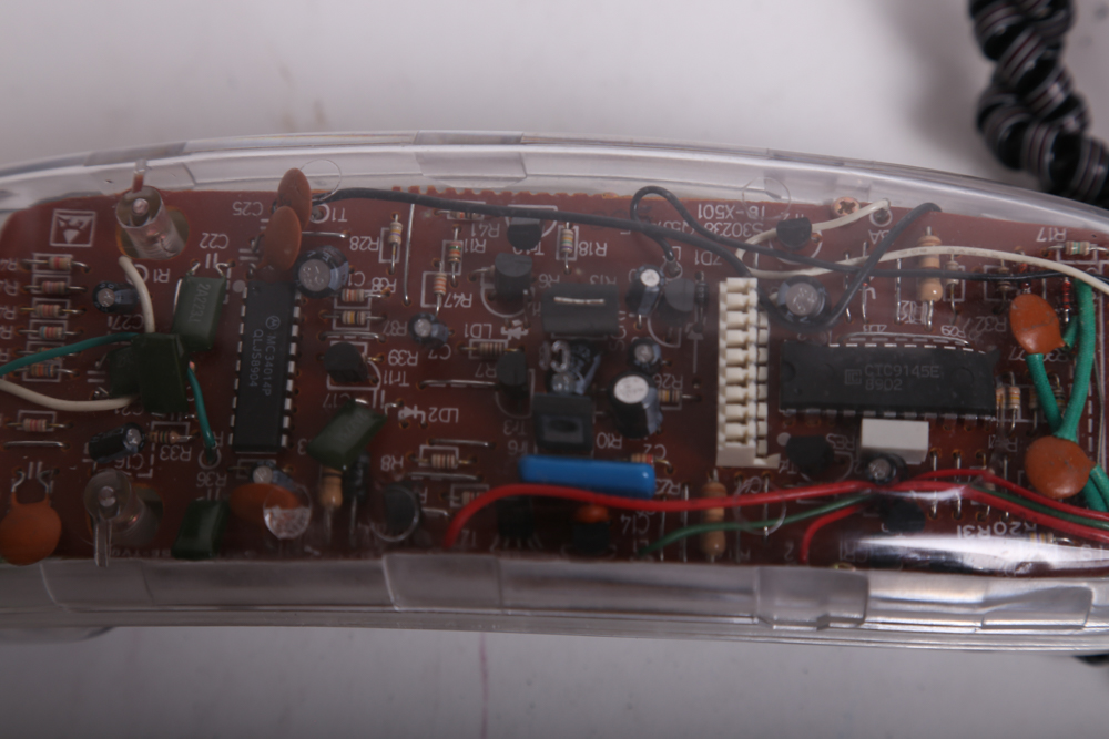 Vintage Panasonic Clock Radio and Transparent GoldStar Telephone