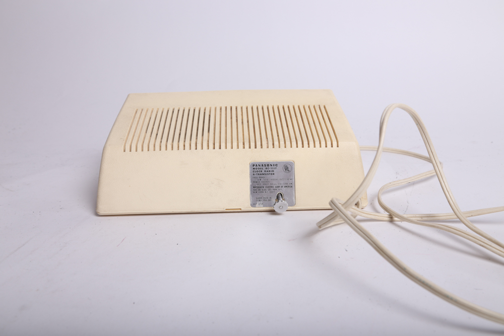 Vintage Panasonic Clock Radio and Transparent GoldStar Telephone