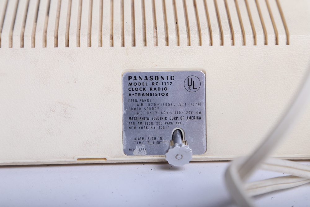 Vintage Panasonic Clock Radio and Transparent GoldStar Telephone