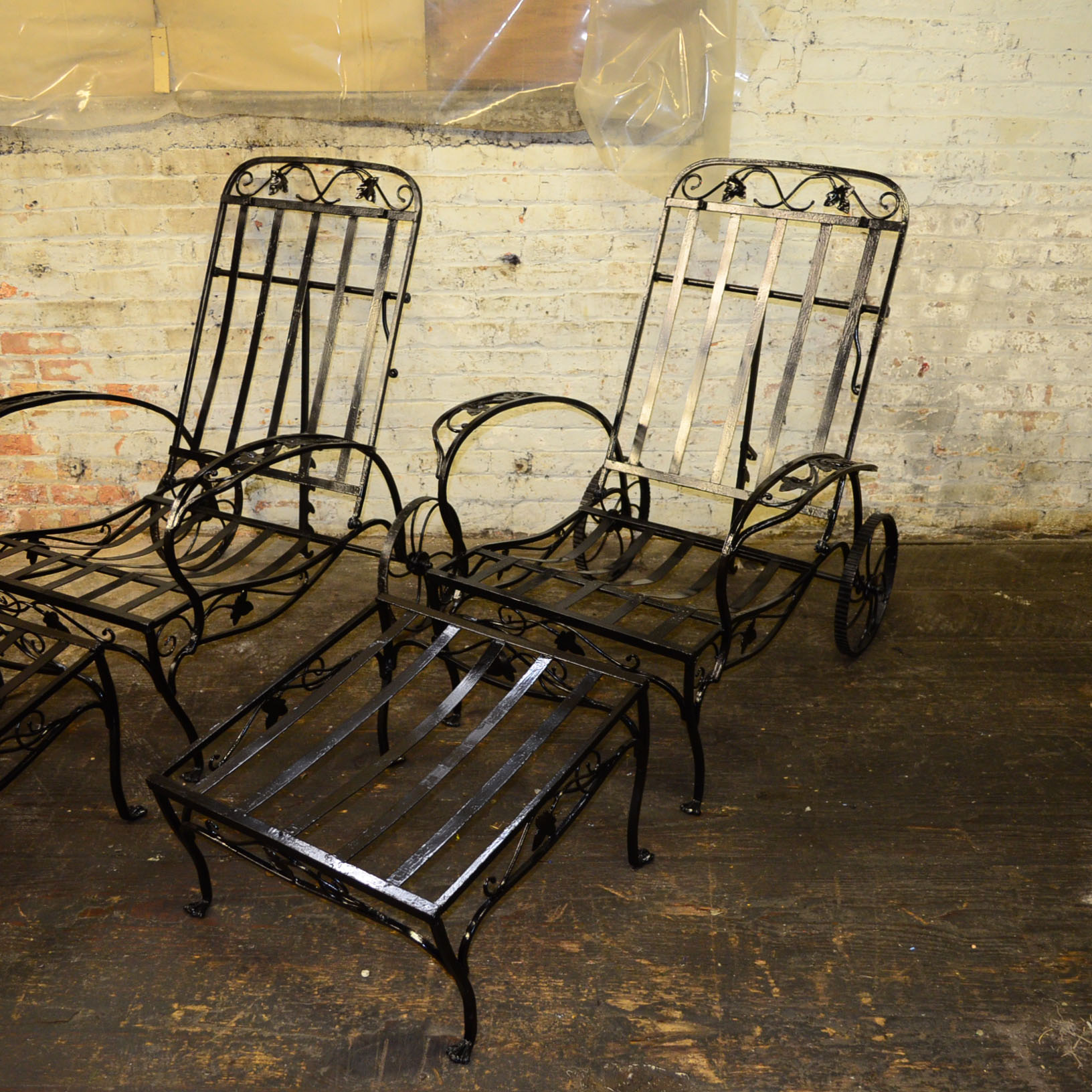Pair of Cast Iron Lounge Chairs And Ottomans