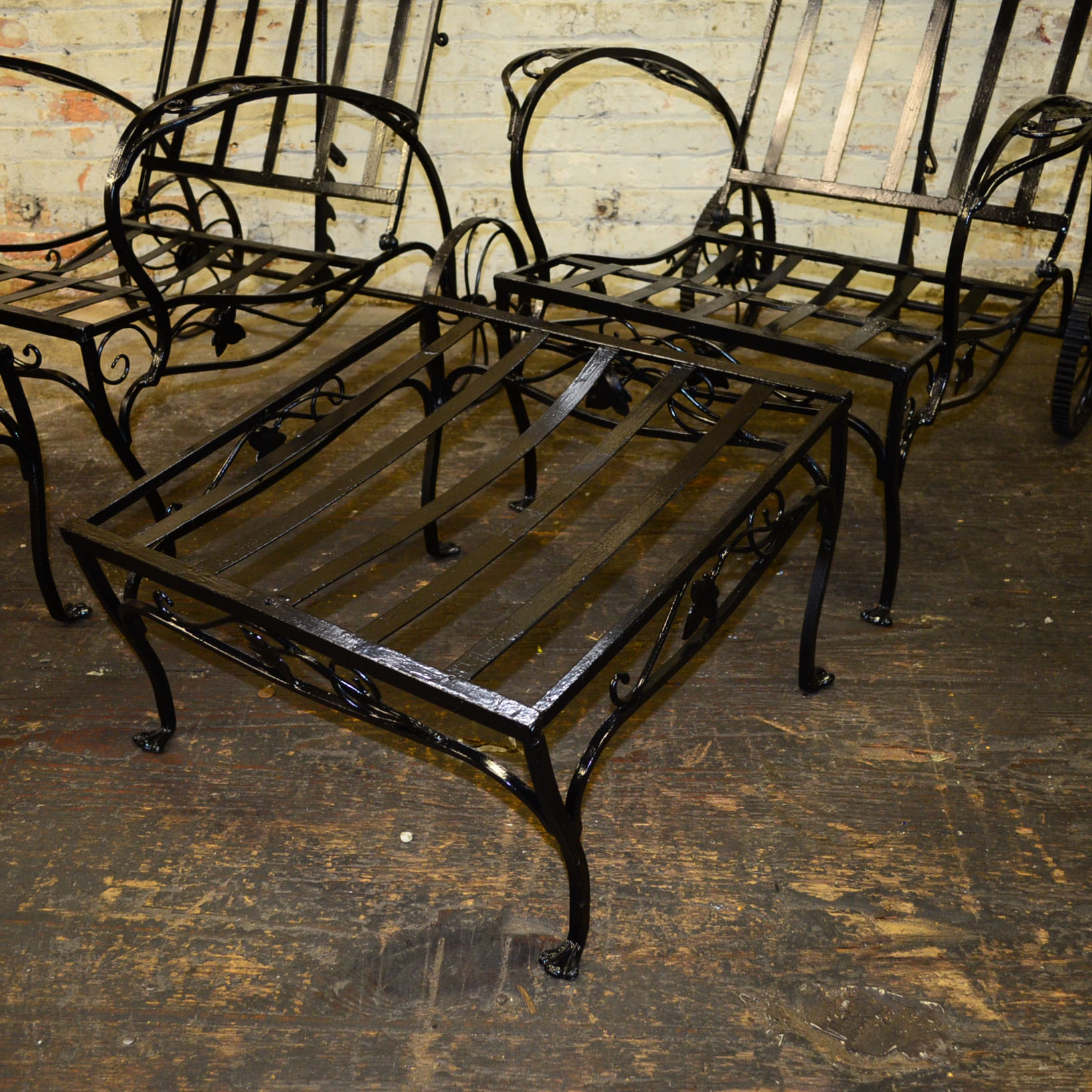 Pair of Cast Iron Lounge Chairs And Ottomans