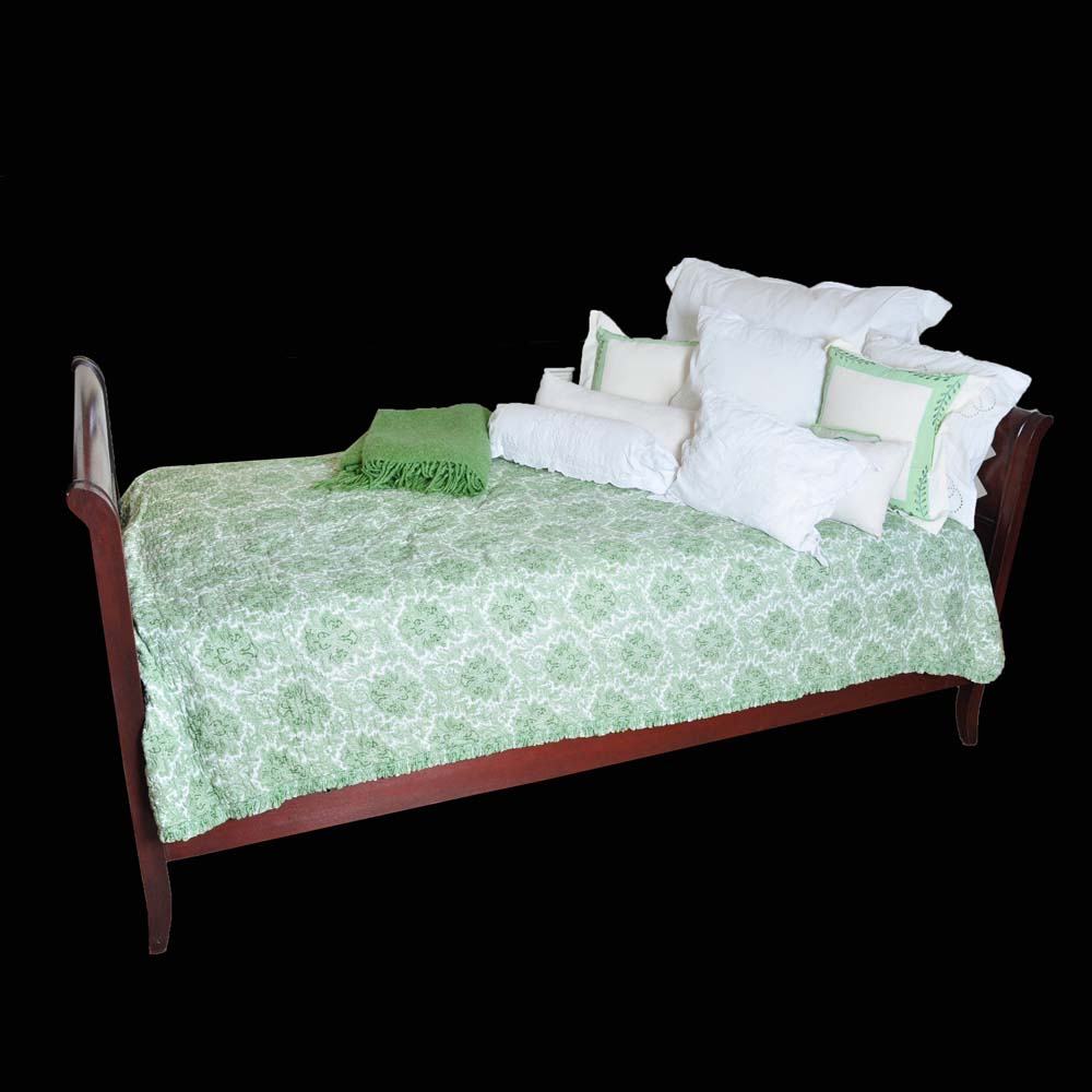 Mahogany Stained Daybed with Coordinating Linens and Pillows