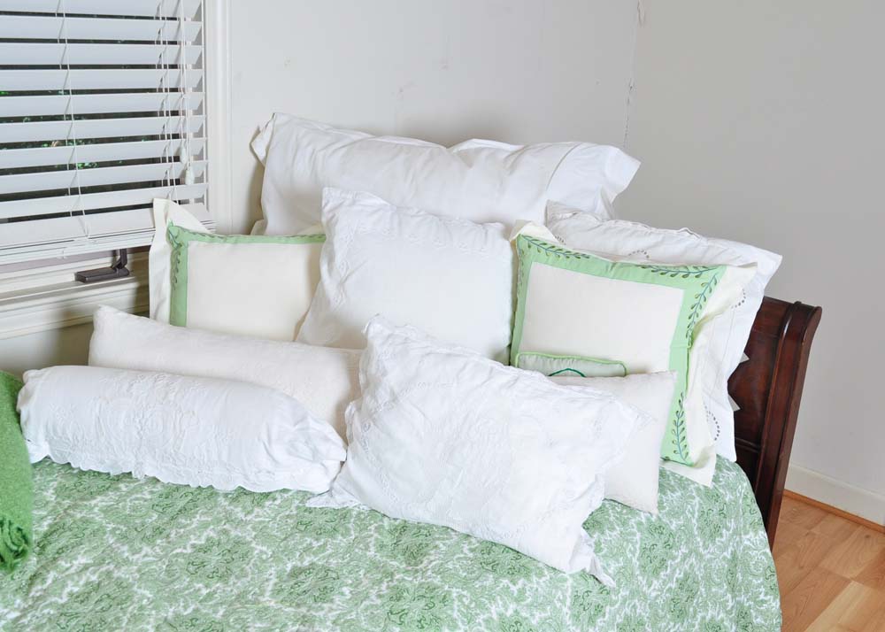 Mahogany Stained Daybed with Coordinating Linens and Pillows