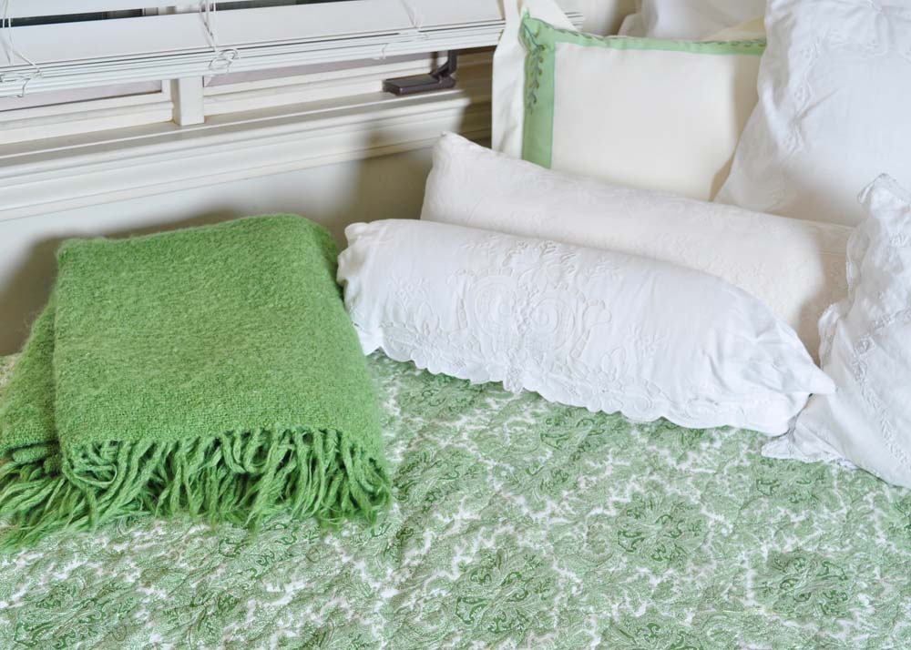 Mahogany Stained Daybed with Coordinating Linens and Pillows