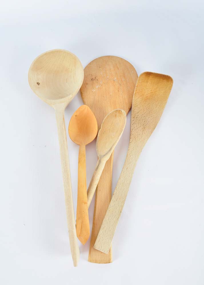 Stoneware Crock Filled with Wooden Kitchen Tools