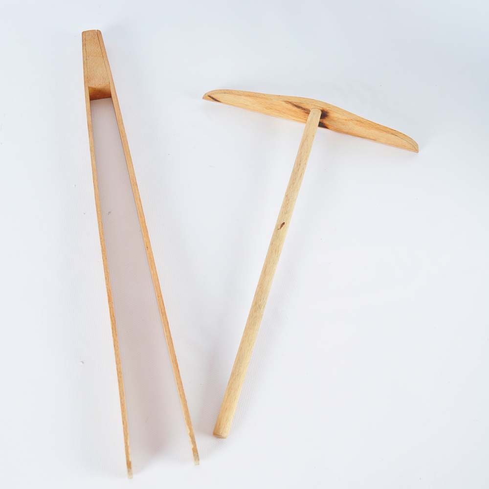 Stoneware Crock Filled with Wooden Kitchen Tools