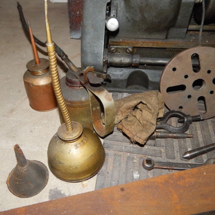 Vintage Oil Cans and Tools in a Wood Chest