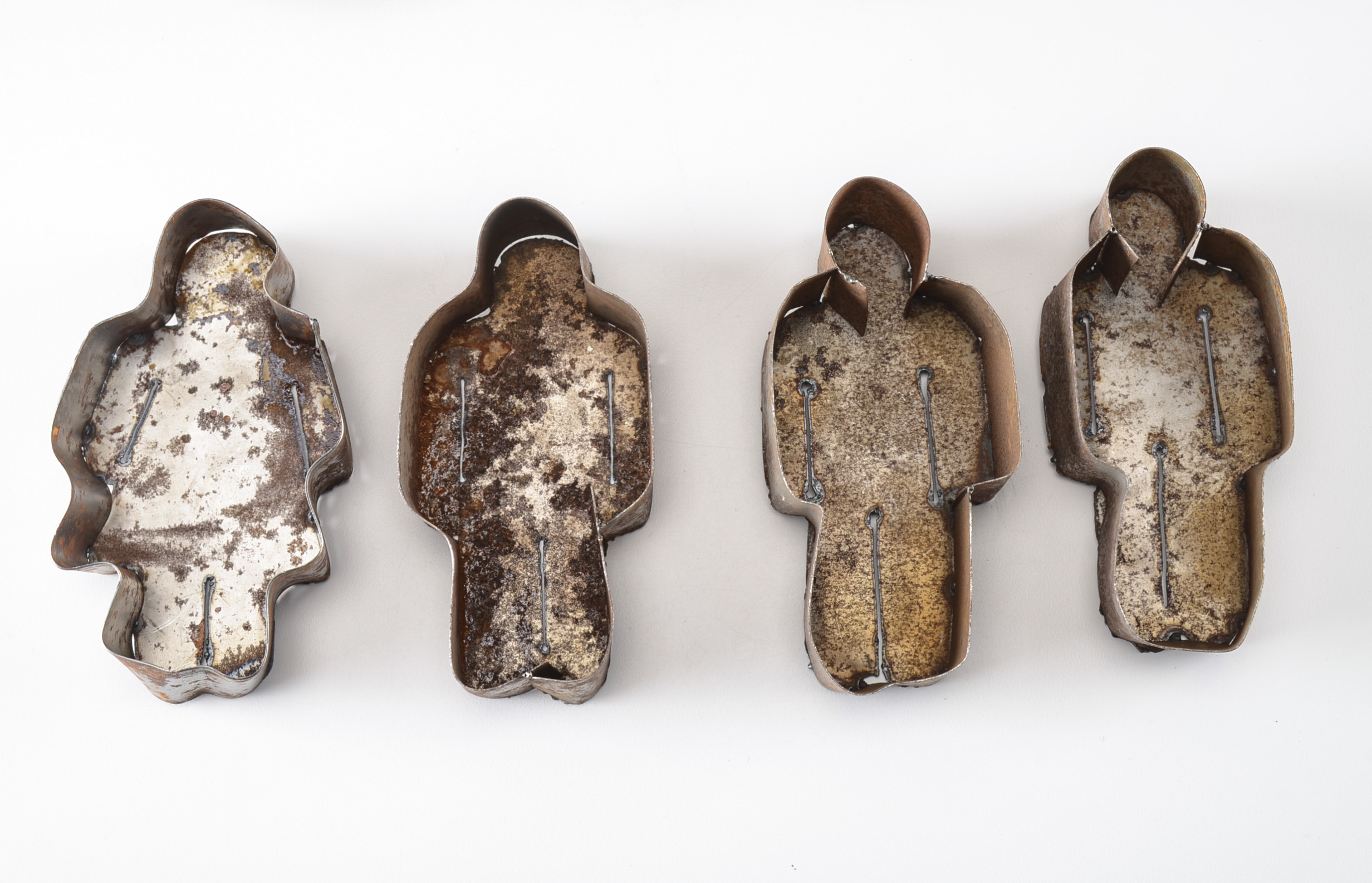 Group of Four Metal Figural Molds and Pair of Vintage Lamps