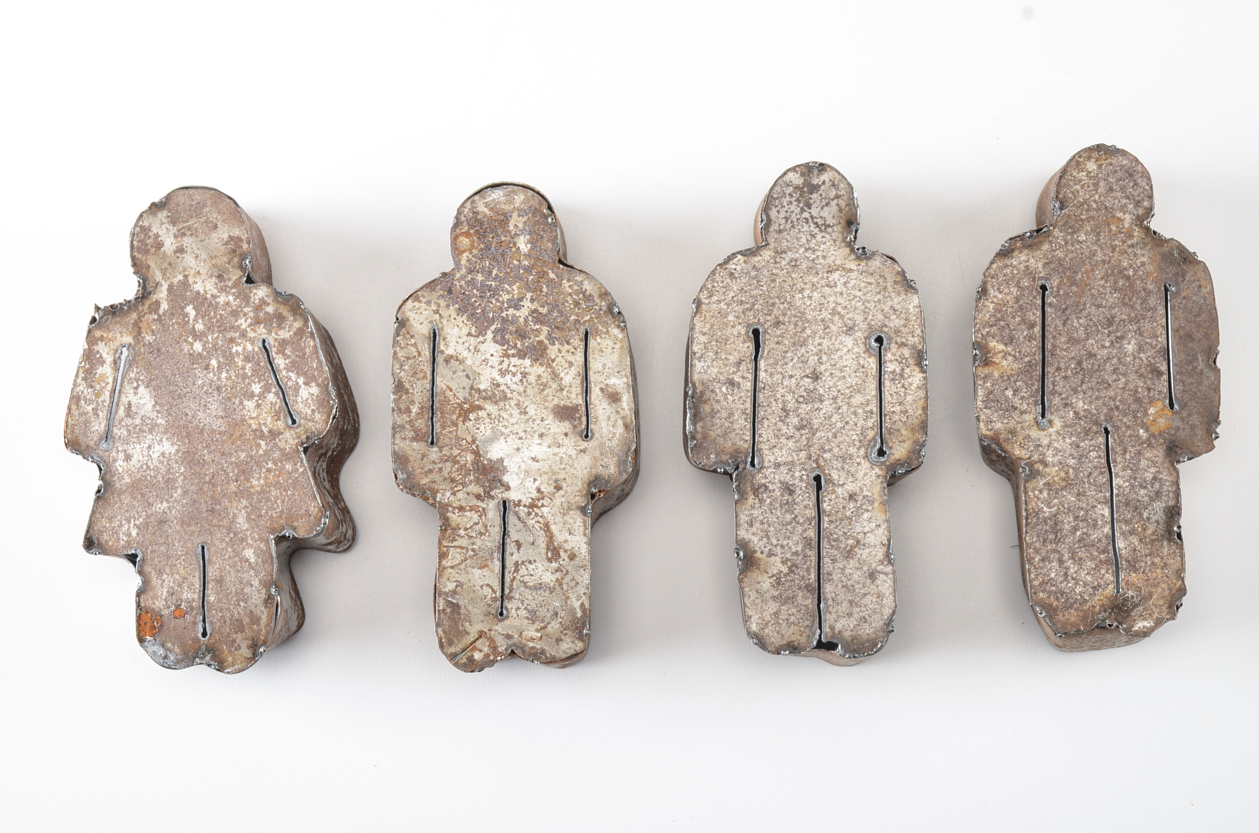 Group of Four Metal Figural Molds and Pair of Vintage Lamps