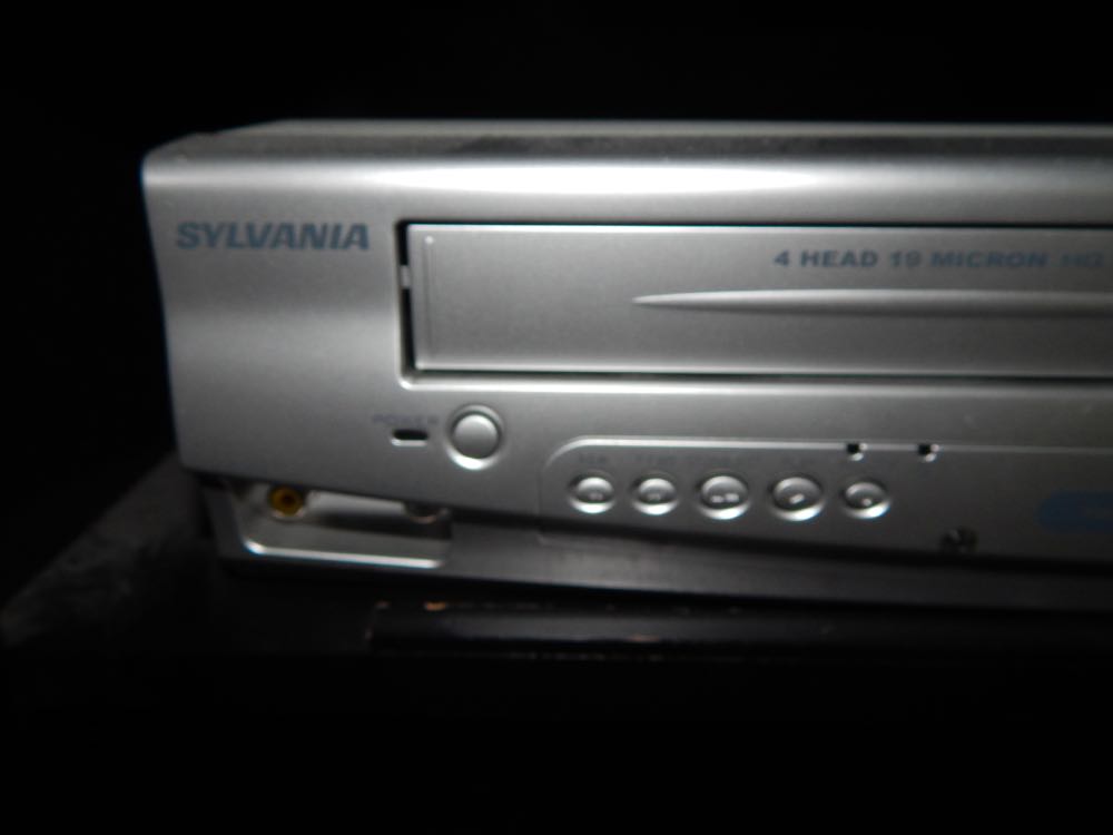 42" LG Plasma Television and Sylvania VHS/CD/DVD Player