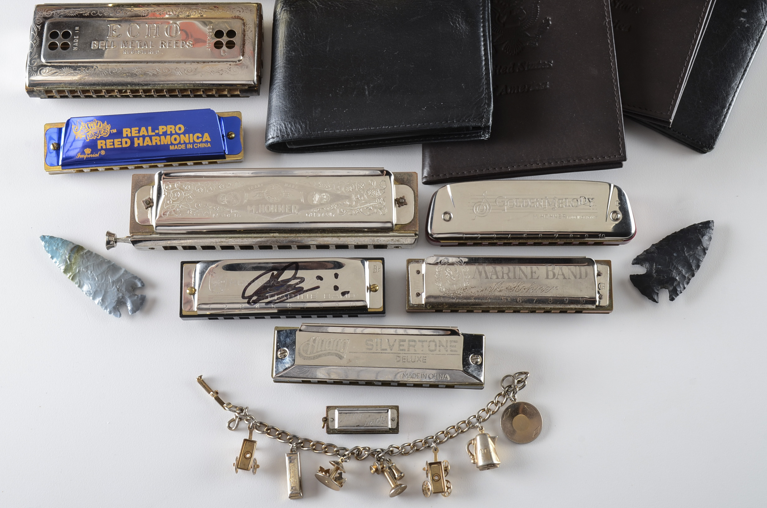 Nine Harmonicas and Collectibles in a Vintage Hat Box