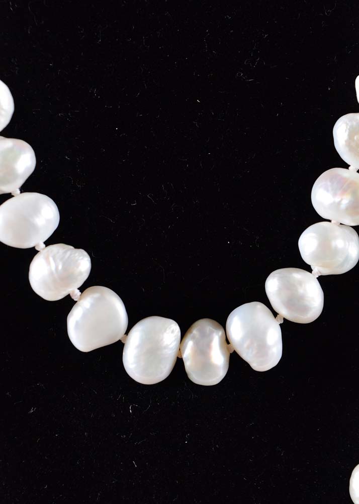 Ornate Gemstone Pendant on Freshwater Pearl Strand