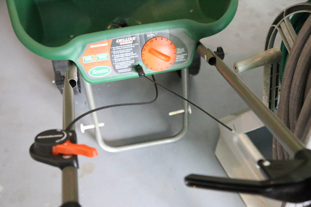 Garden Hoses and Scotts Deluxe Spreader