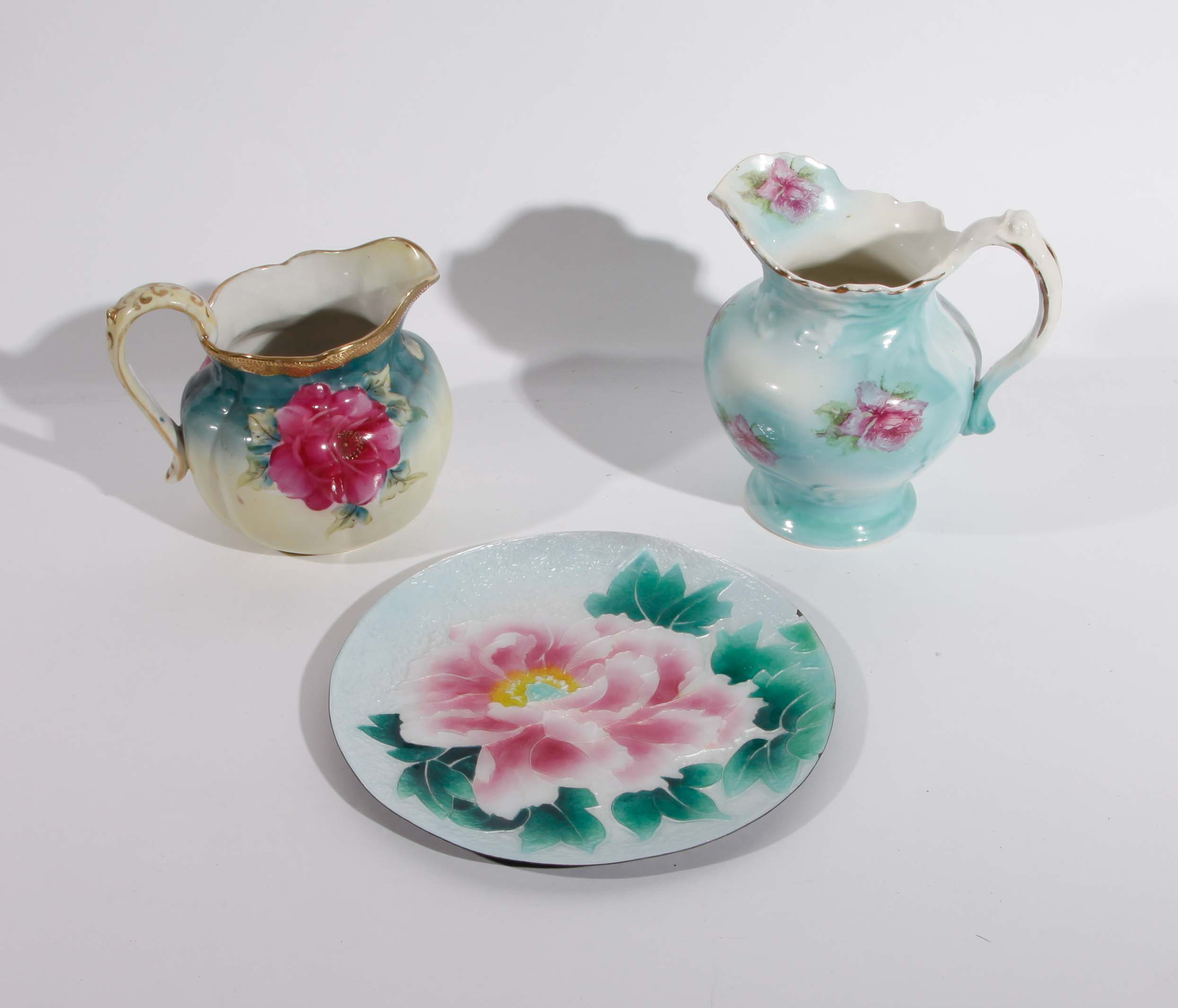 Grouping of Floral and Pastel Saucer and Pitchers