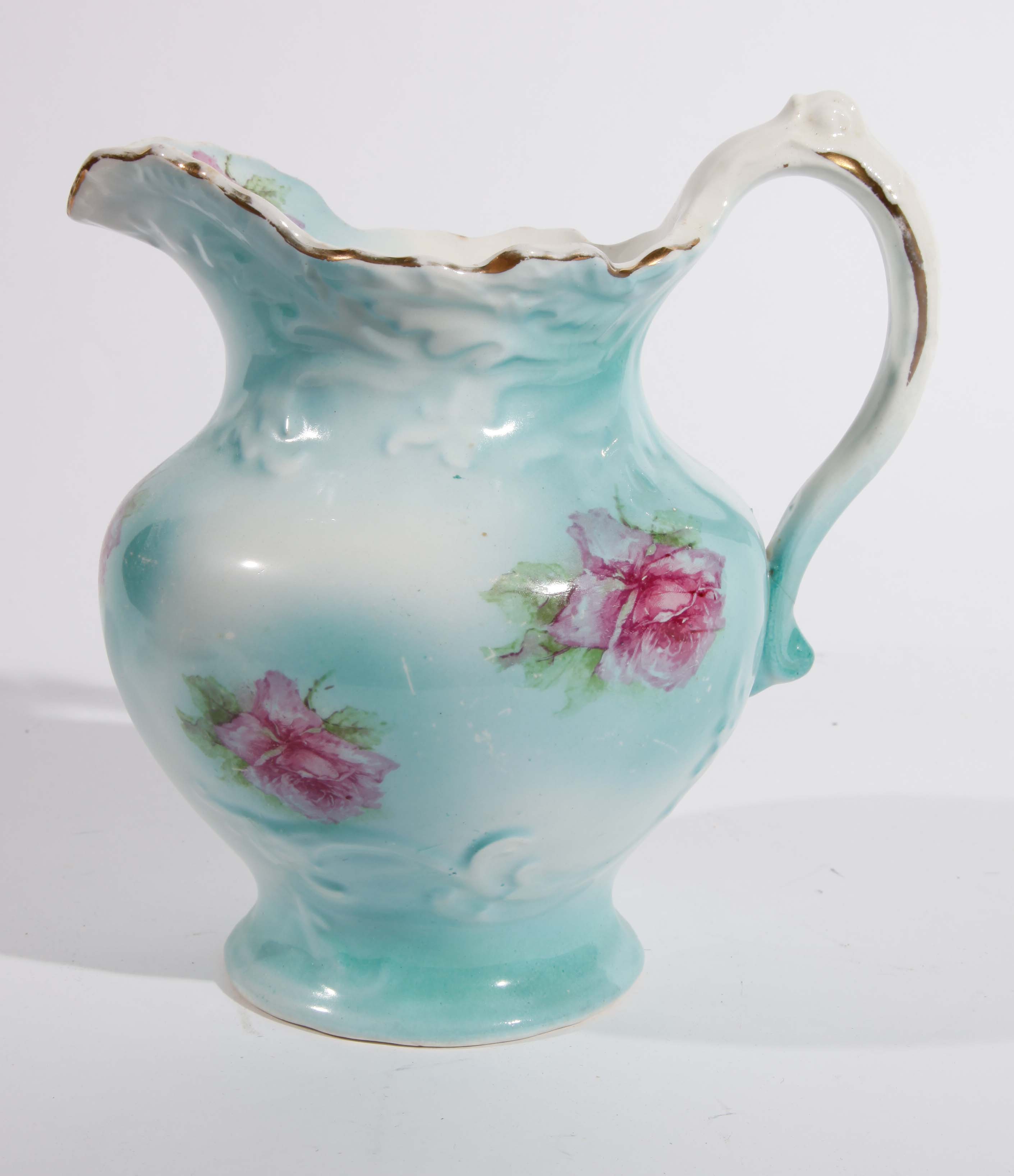 Grouping of Floral and Pastel Saucer and Pitchers