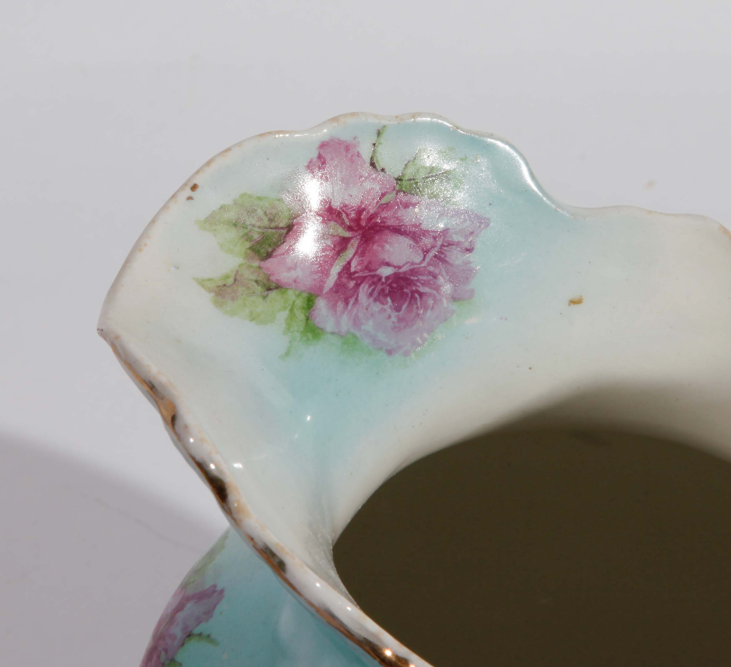 Grouping of Floral and Pastel Saucer and Pitchers