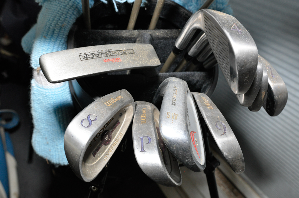 Set of Vintage Golf Clubs, Bags, and Equipment