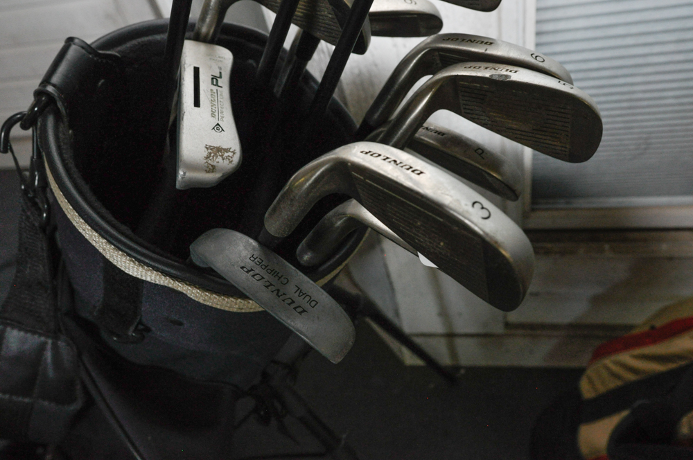 Set of Vintage Golf Clubs, Bags, and Equipment