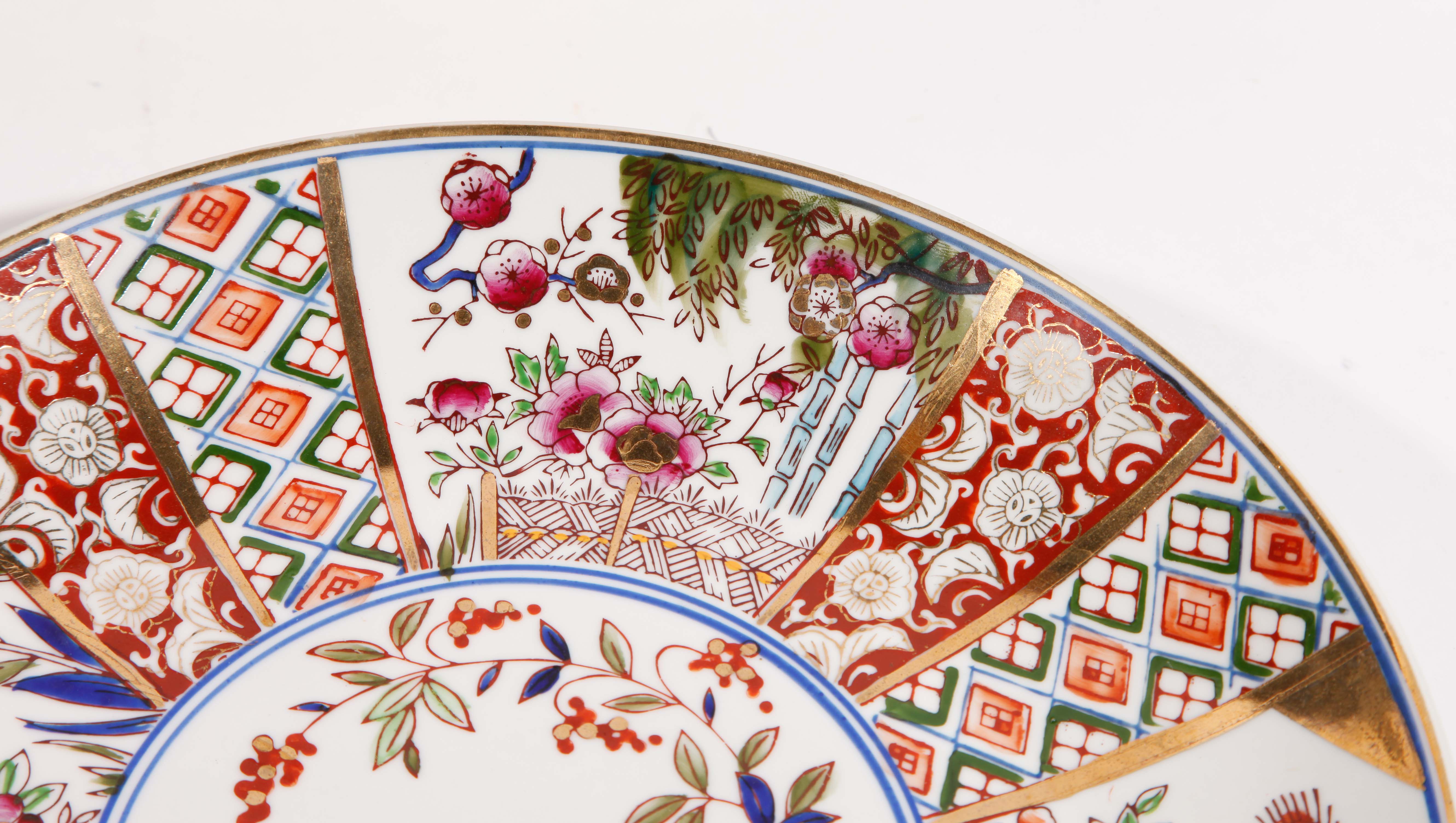 Collection of Decorative Plates and Asian Vases