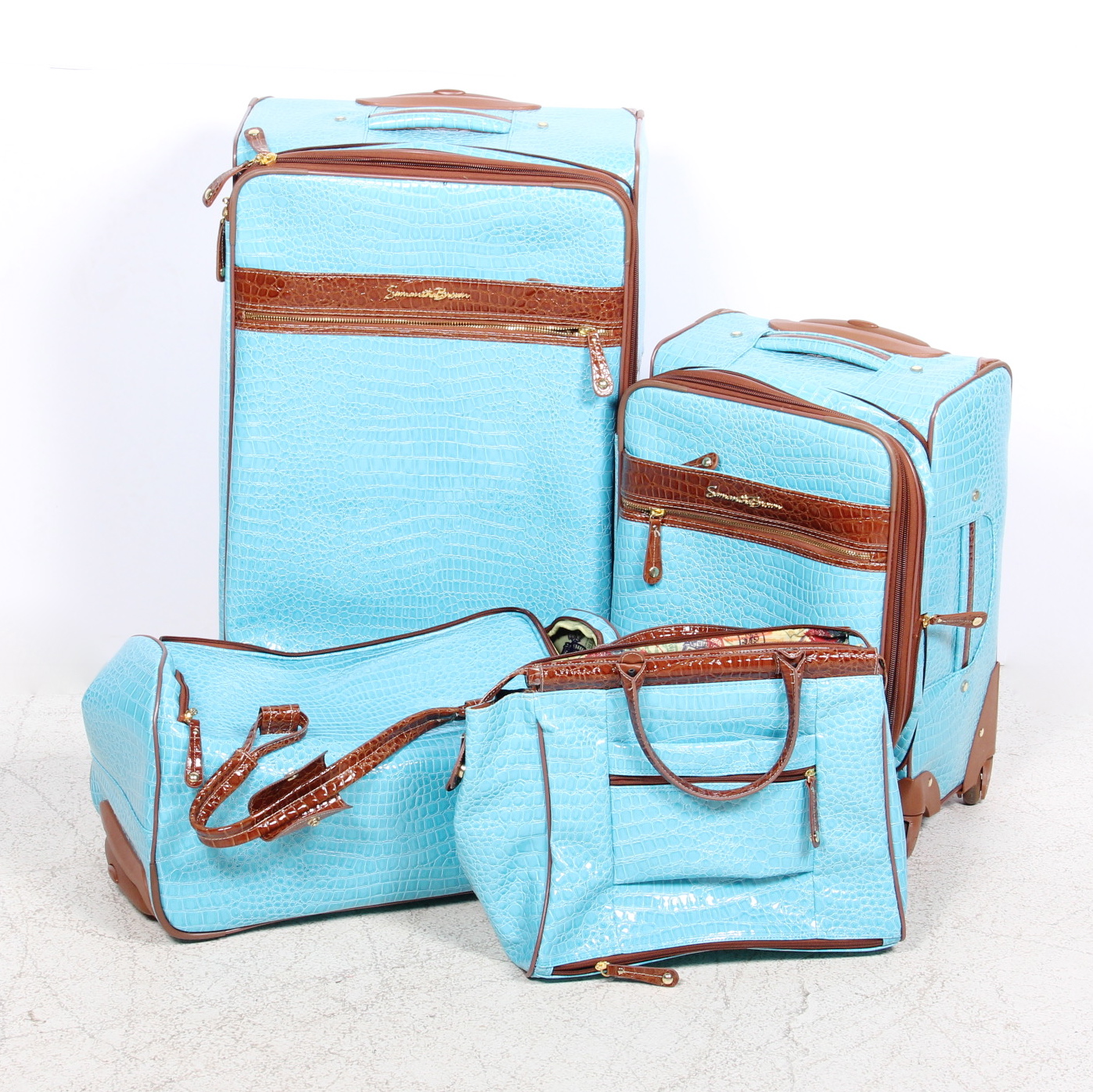 Collection of Samantha Brown Luggage in Aqua