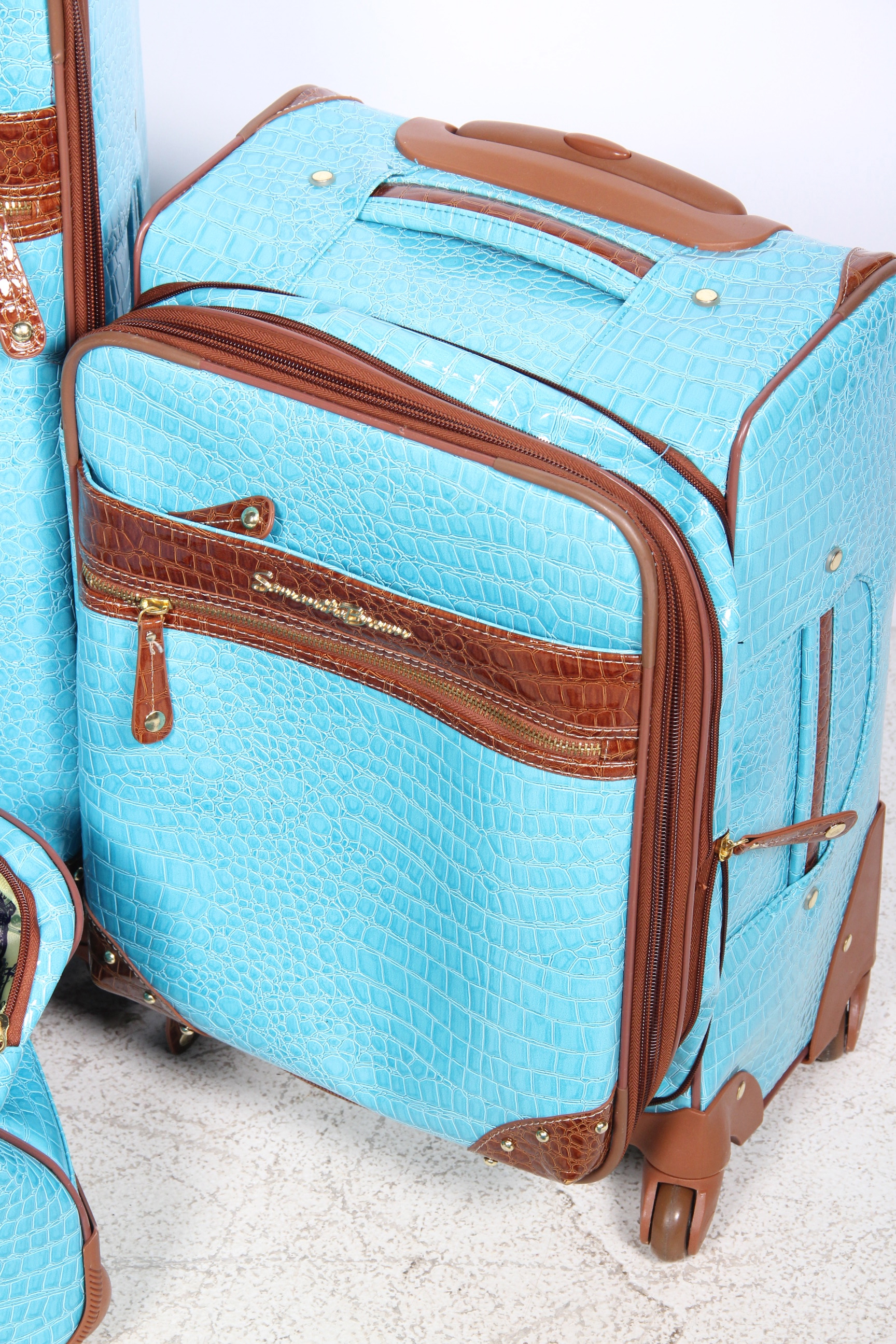 Collection of Samantha Brown Luggage in Aqua