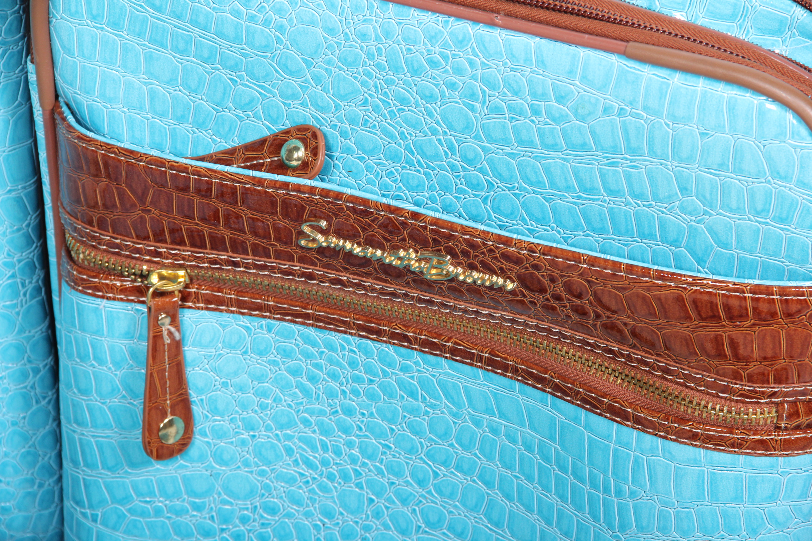 Collection of Samantha Brown Luggage in Aqua