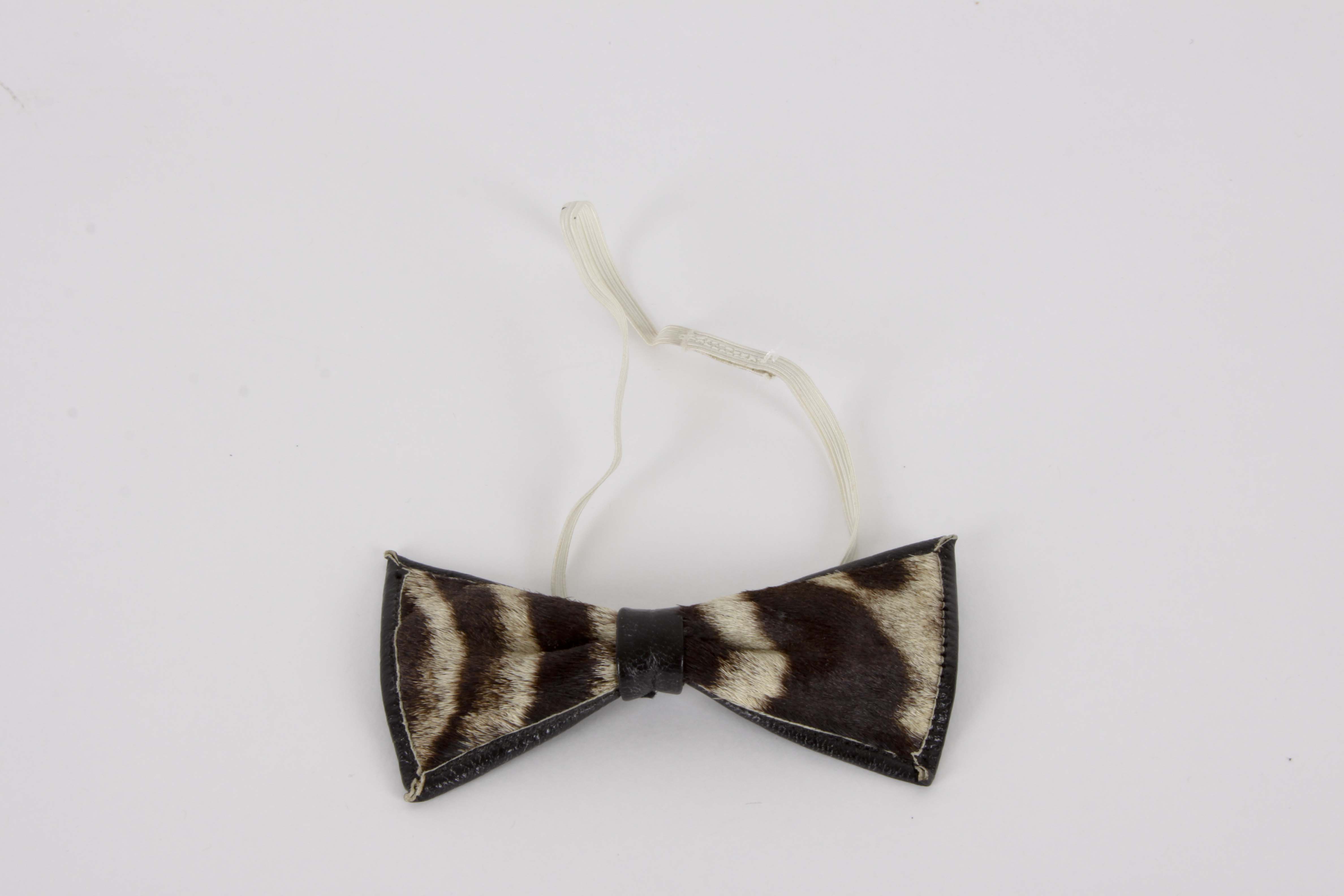 Genuine Zebra Hide Bowtie and Carved Kenyan Figurine