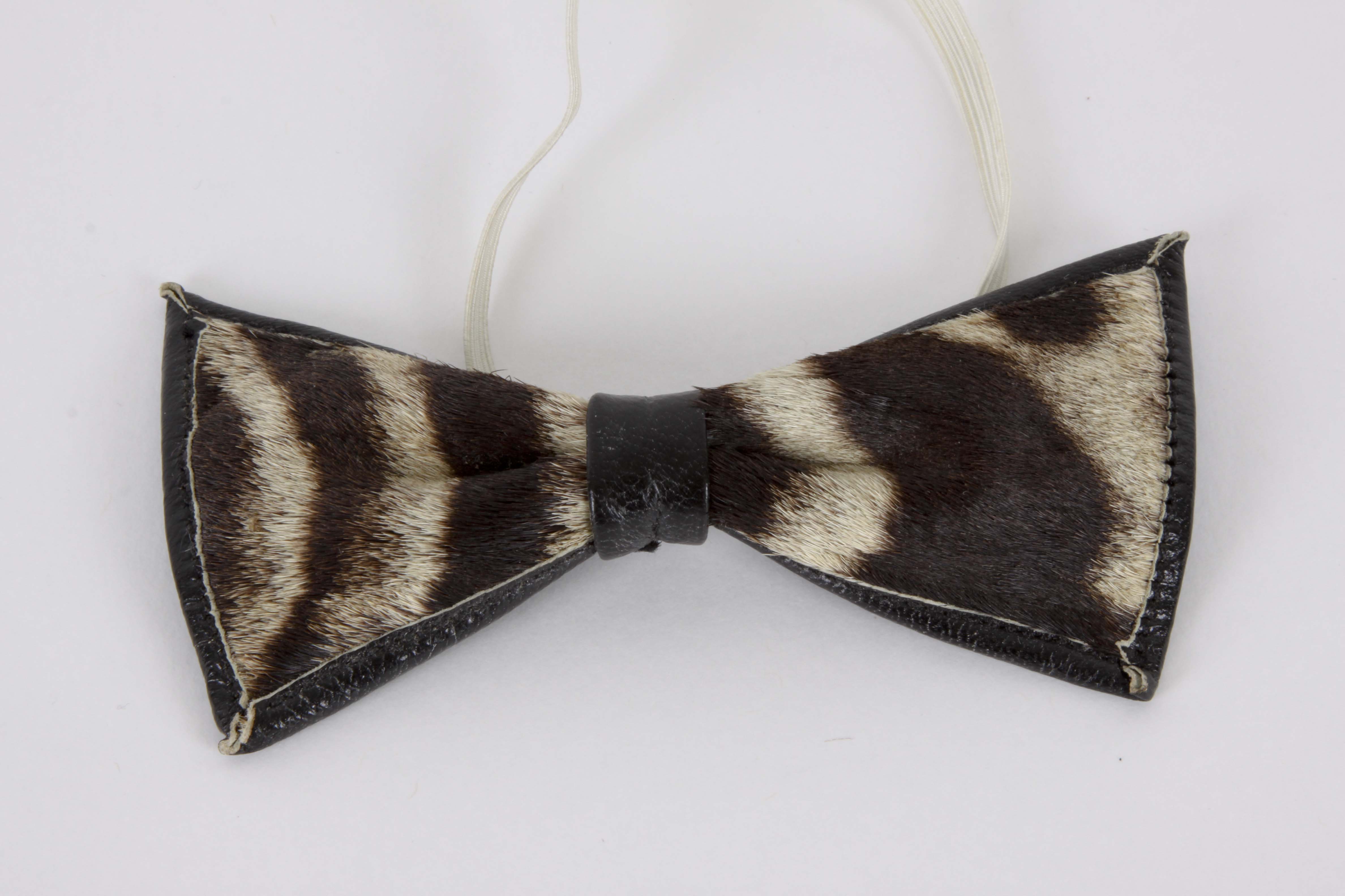 Genuine Zebra Hide Bowtie and Carved Kenyan Figurine