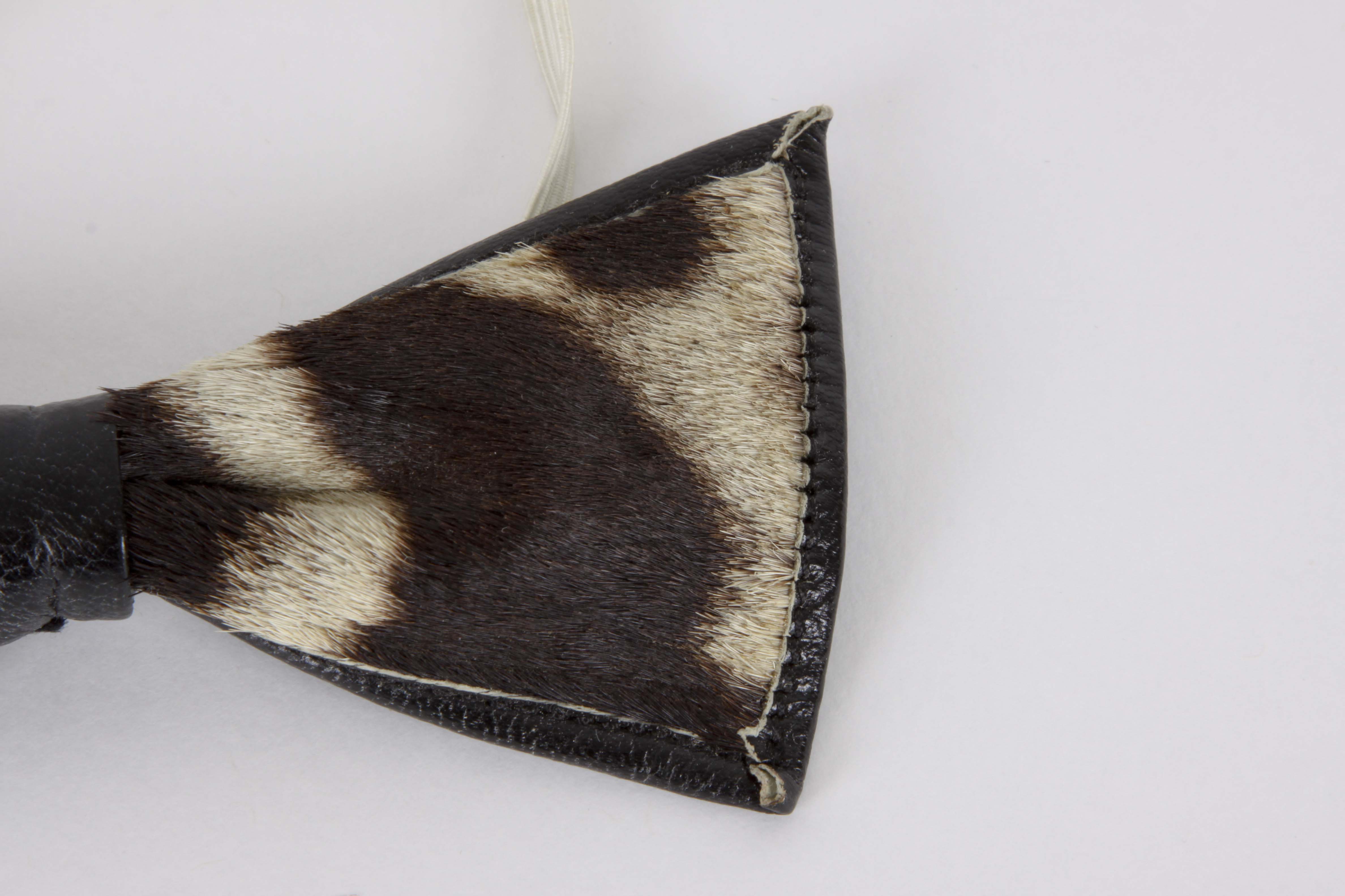 Genuine Zebra Hide Bowtie and Carved Kenyan Figurine