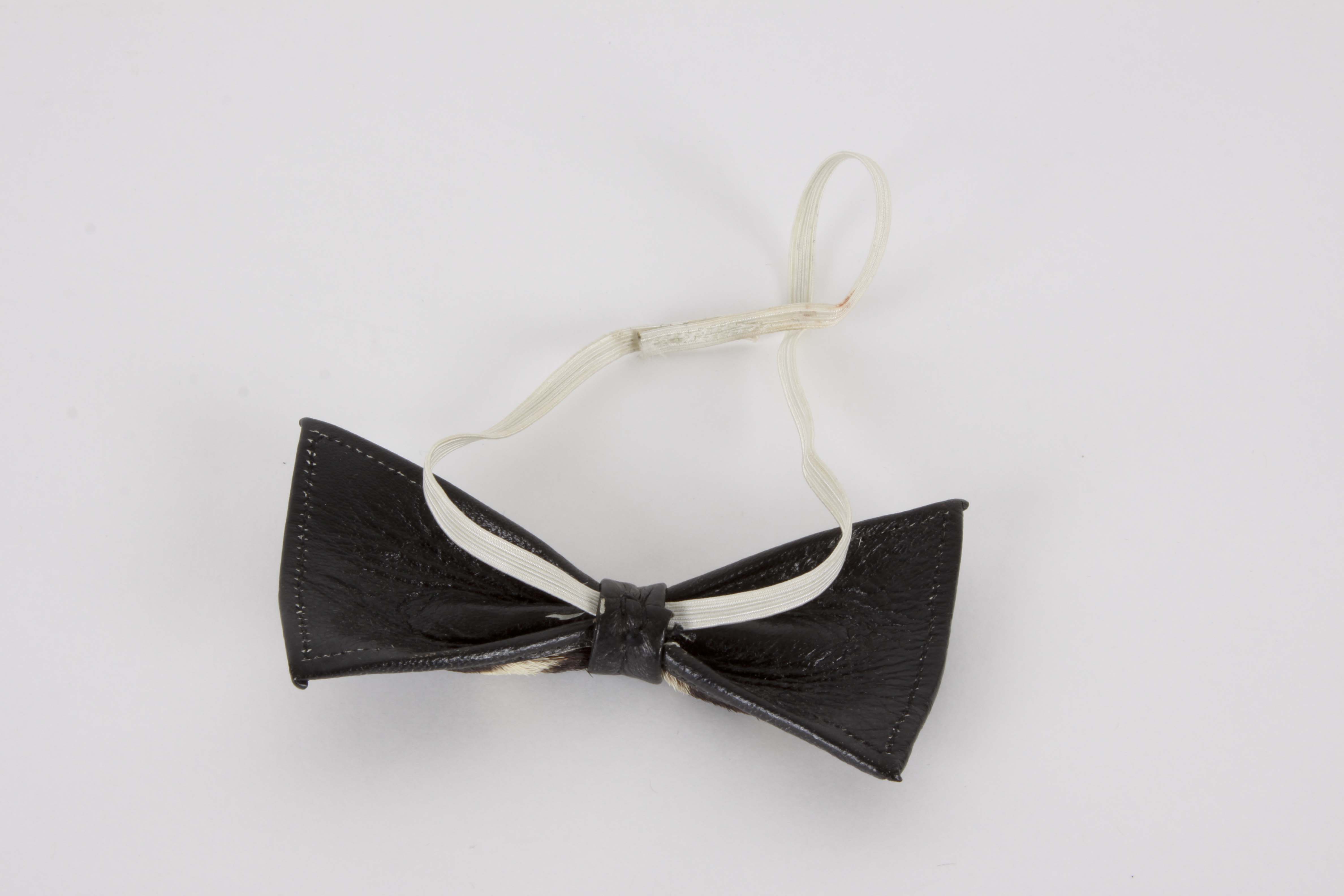 Genuine Zebra Hide Bowtie and Carved Kenyan Figurine