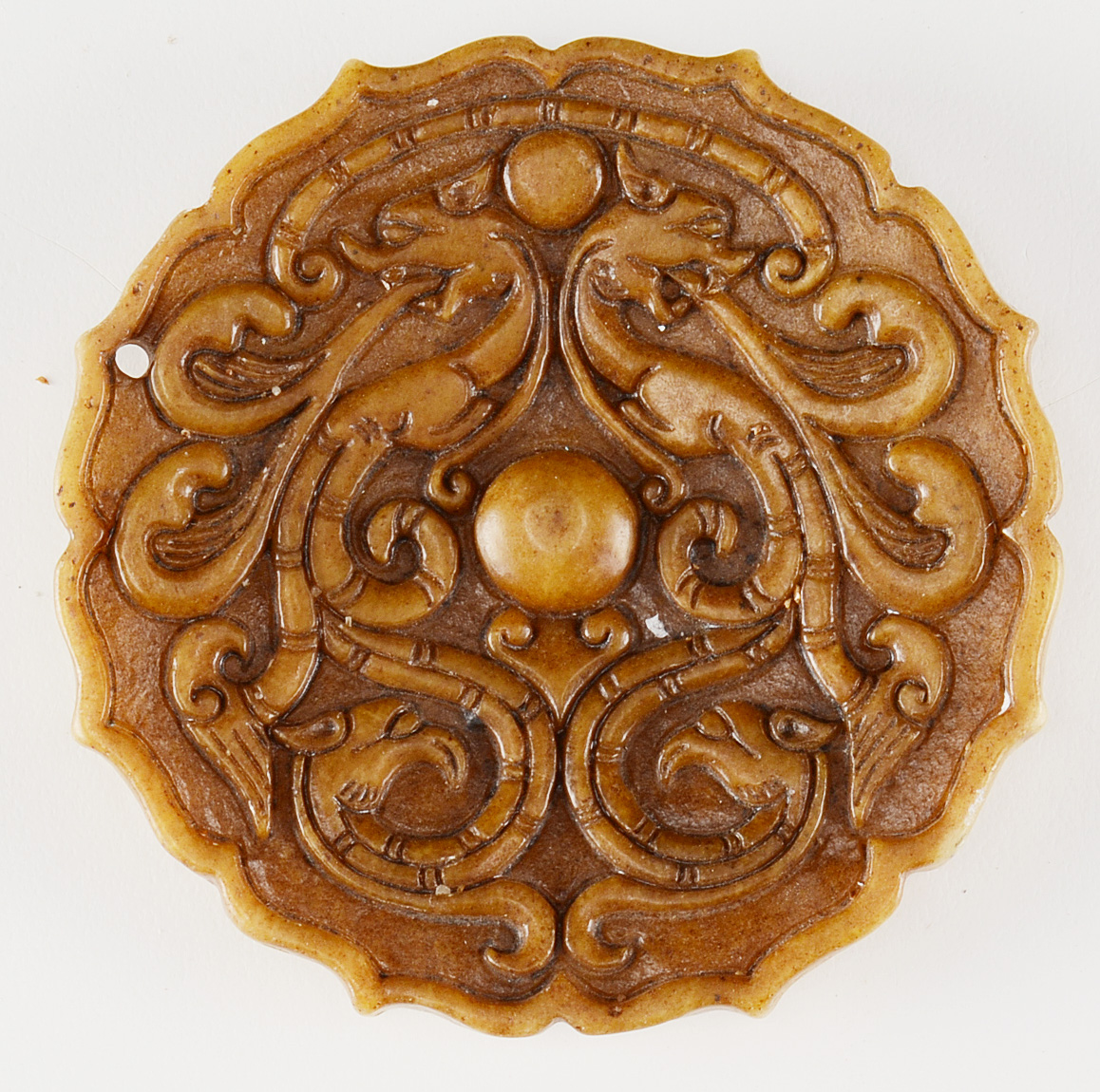 Three Chinese Carved Soapstone Pendants