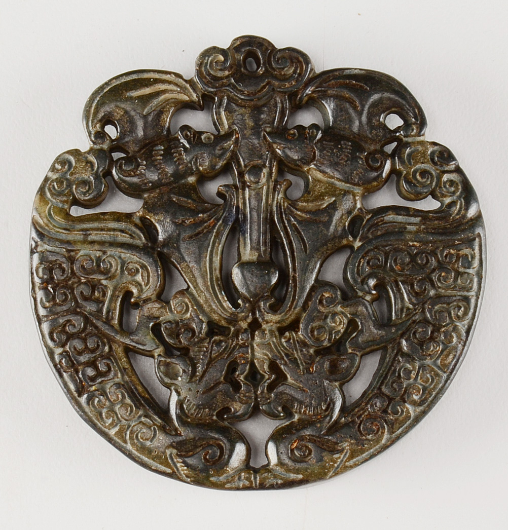 Three Chinese Carved Soapstone Pendants