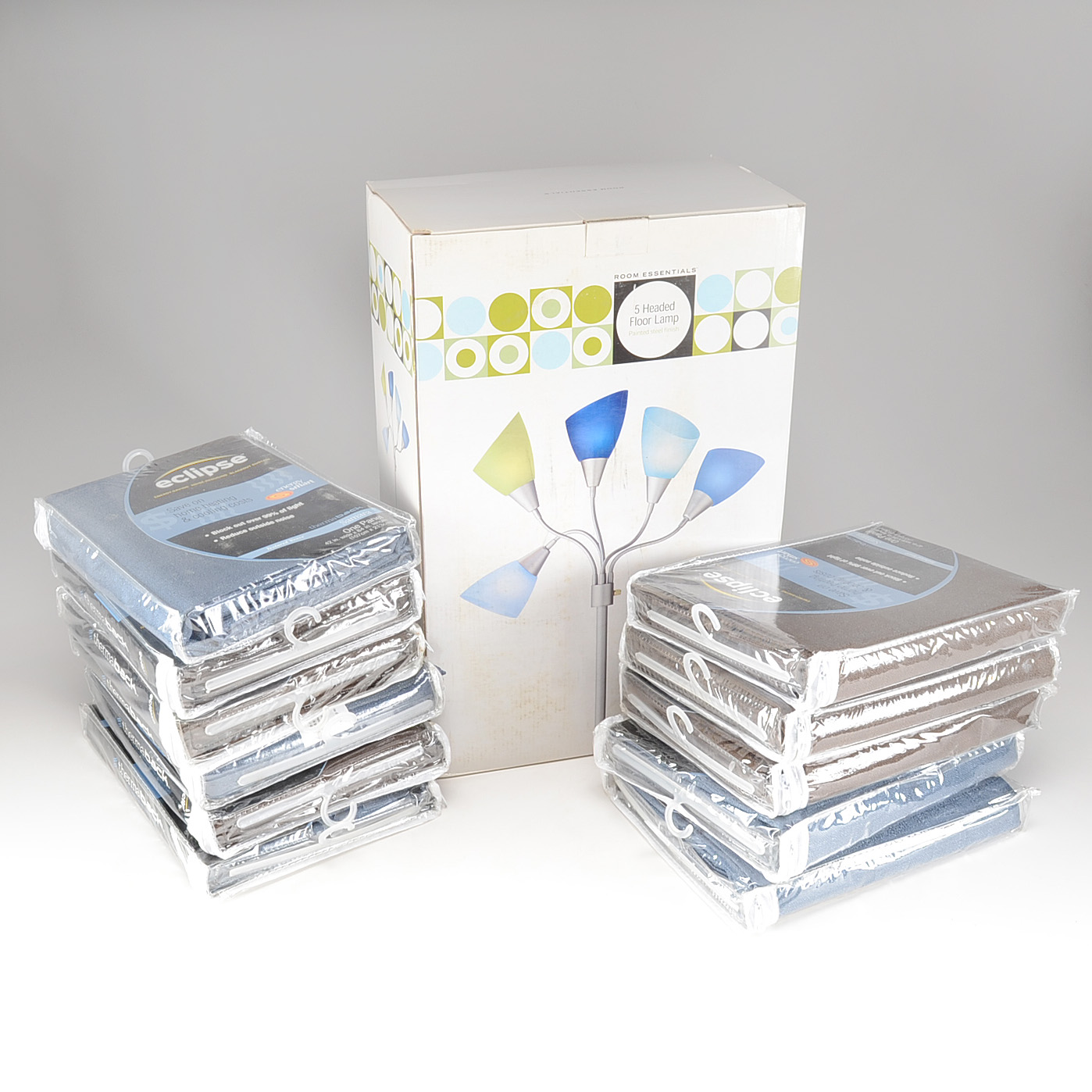 Eleven Curtain Panels and a Floor Lamp