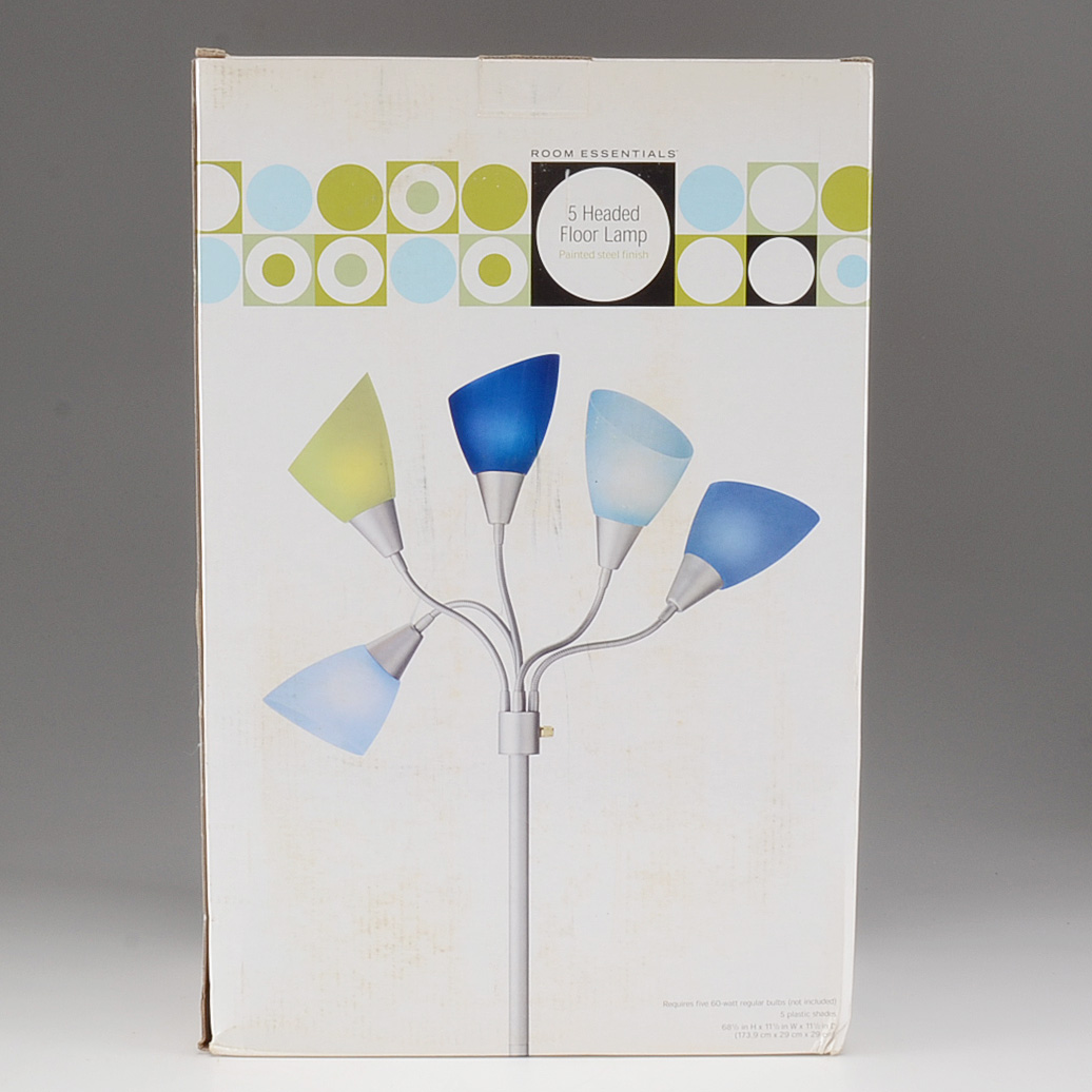 Eleven Curtain Panels and a Floor Lamp