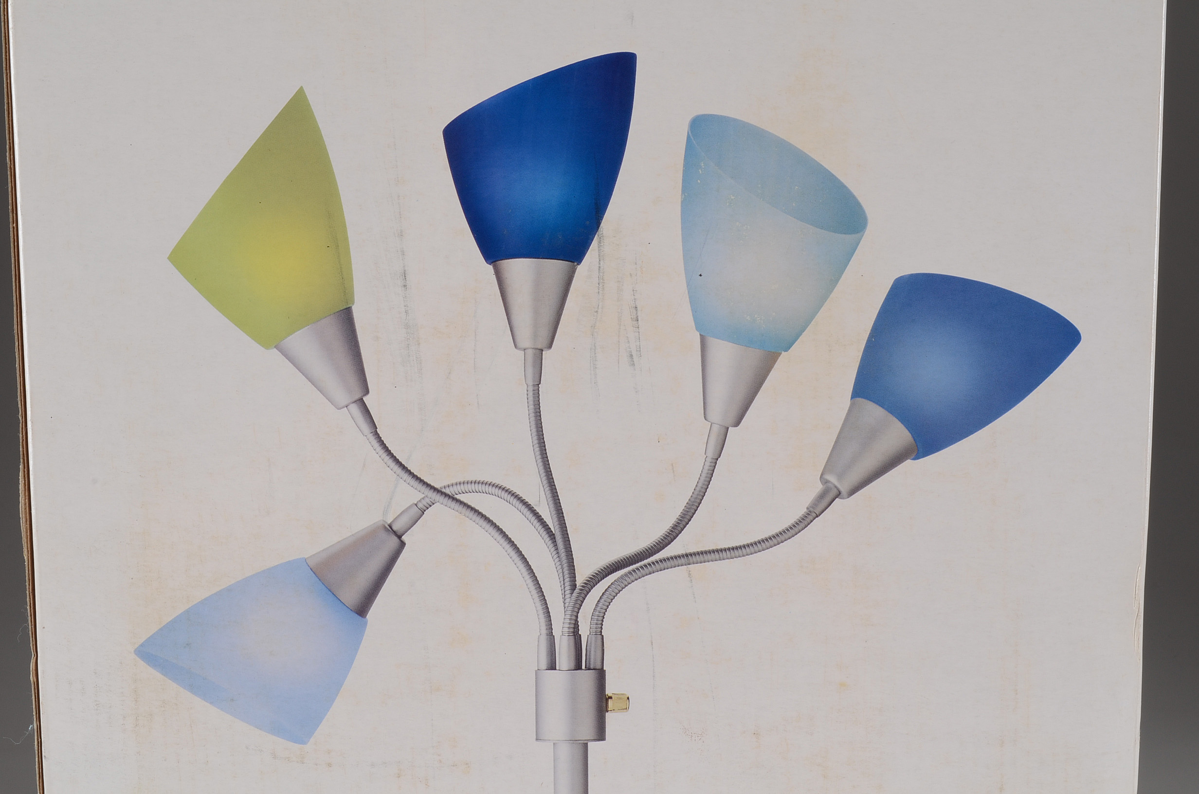 Eleven Curtain Panels and a Floor Lamp