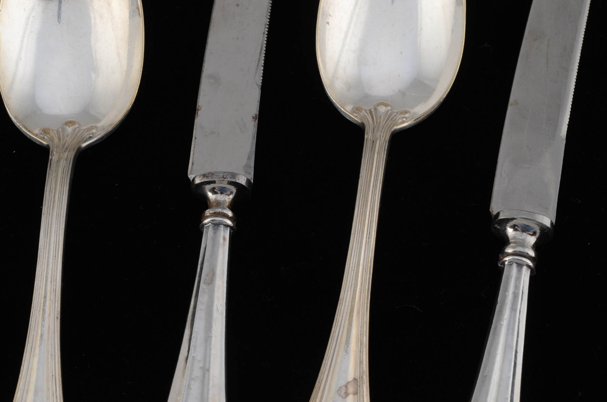 Four Sterling Handle Knives and Three Spoons