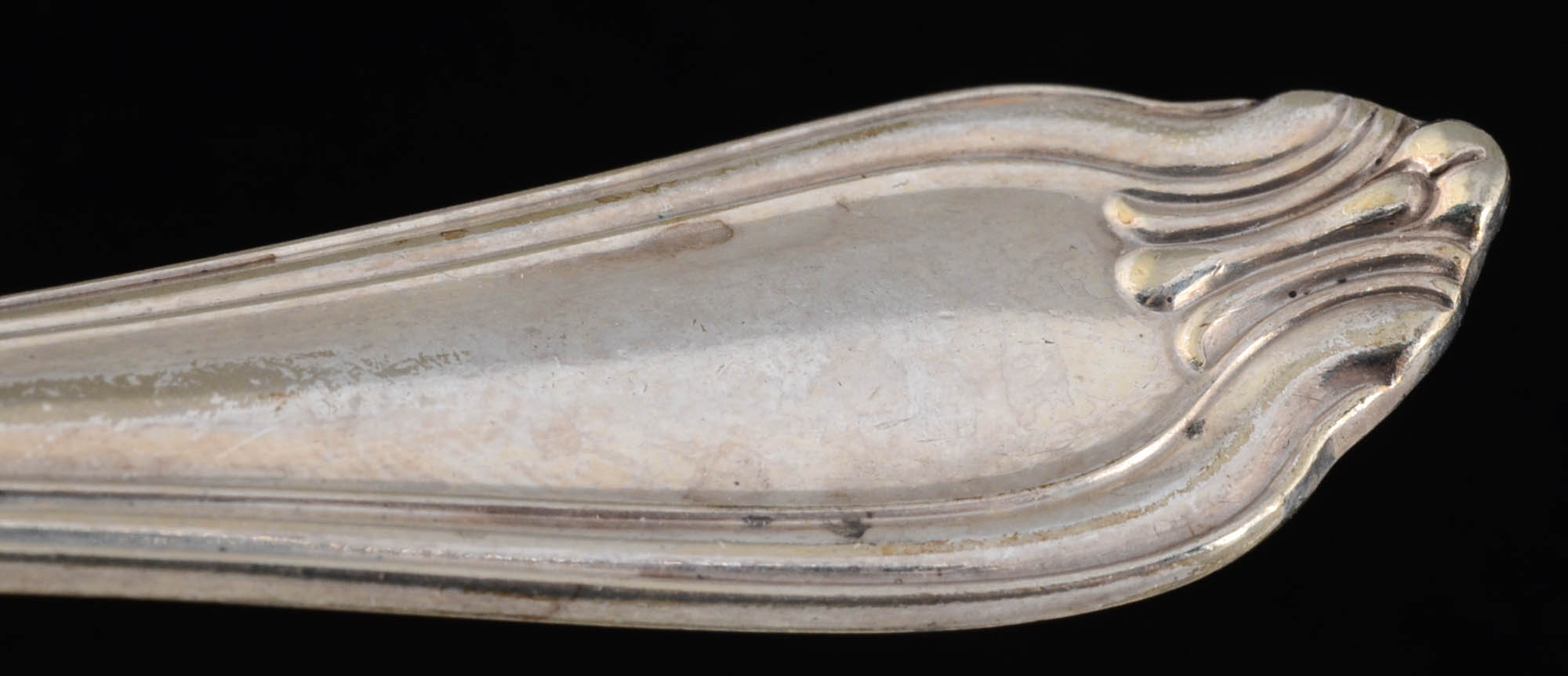 Four Sterling Handle Knives and Three Spoons