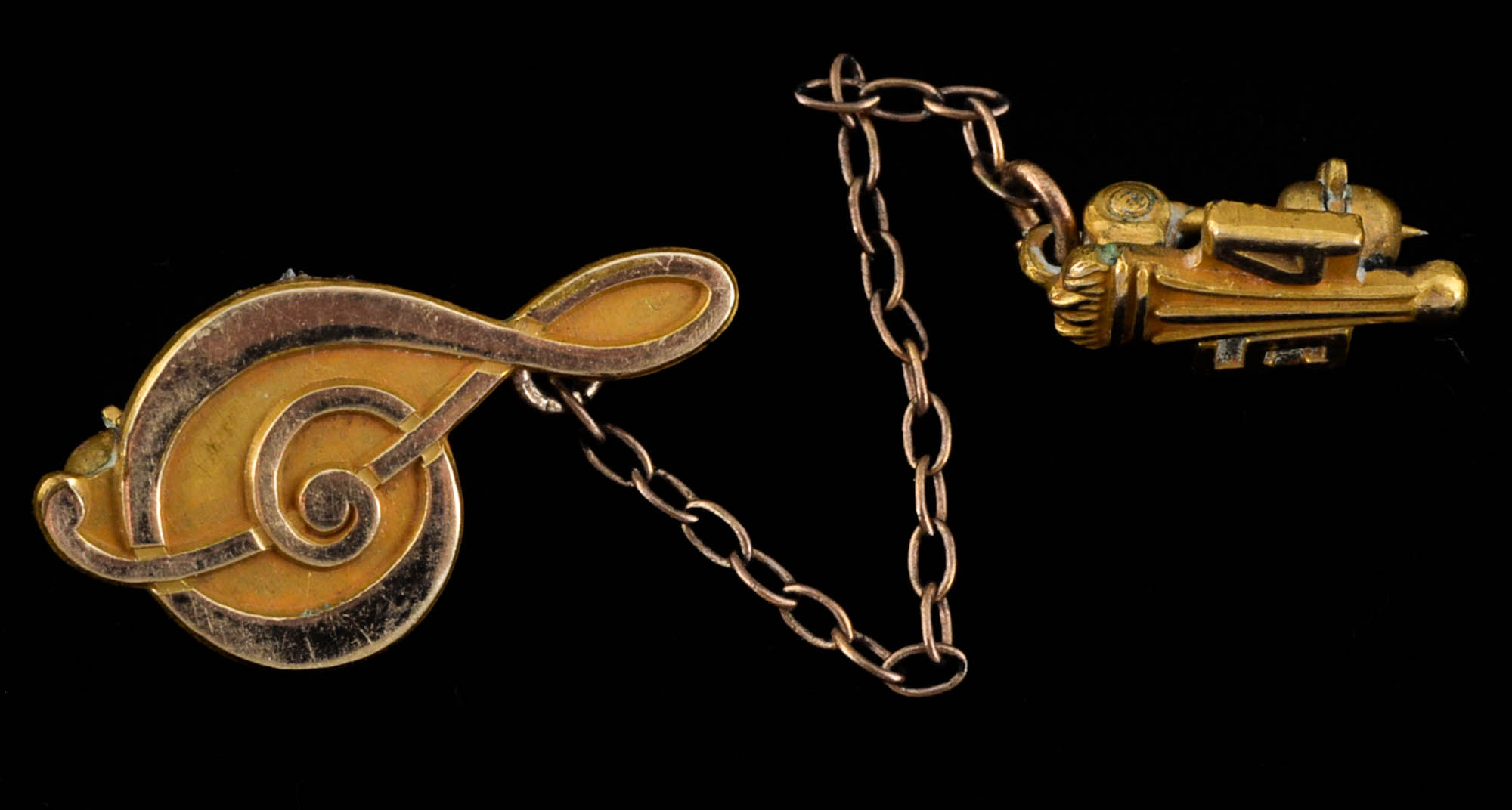 Two Pendants and a Pin