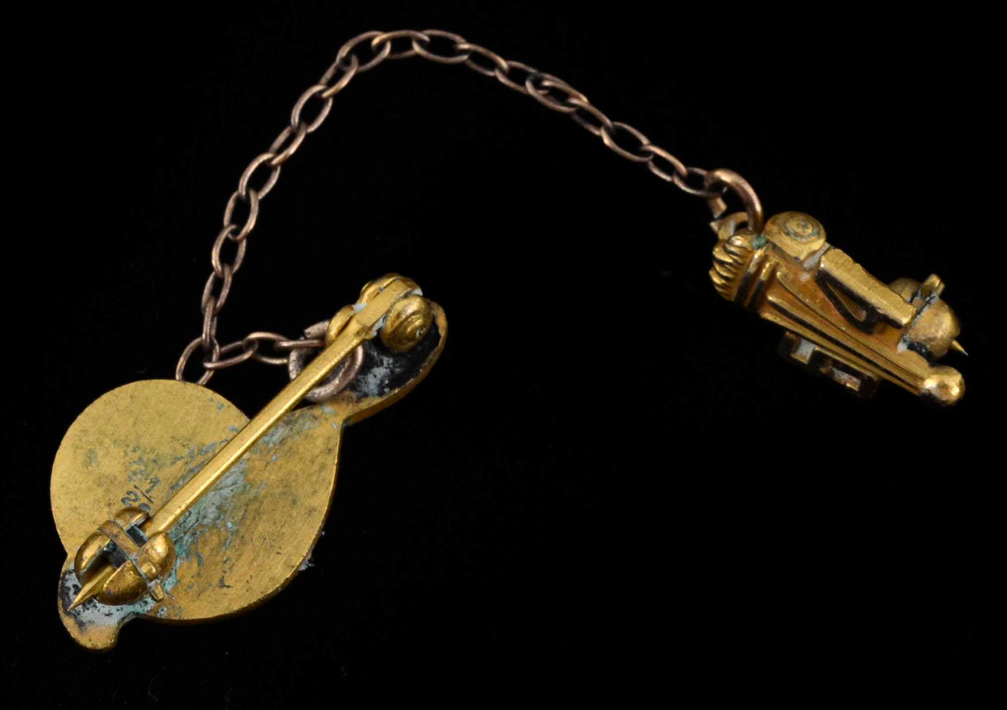 Two Pendants and a Pin