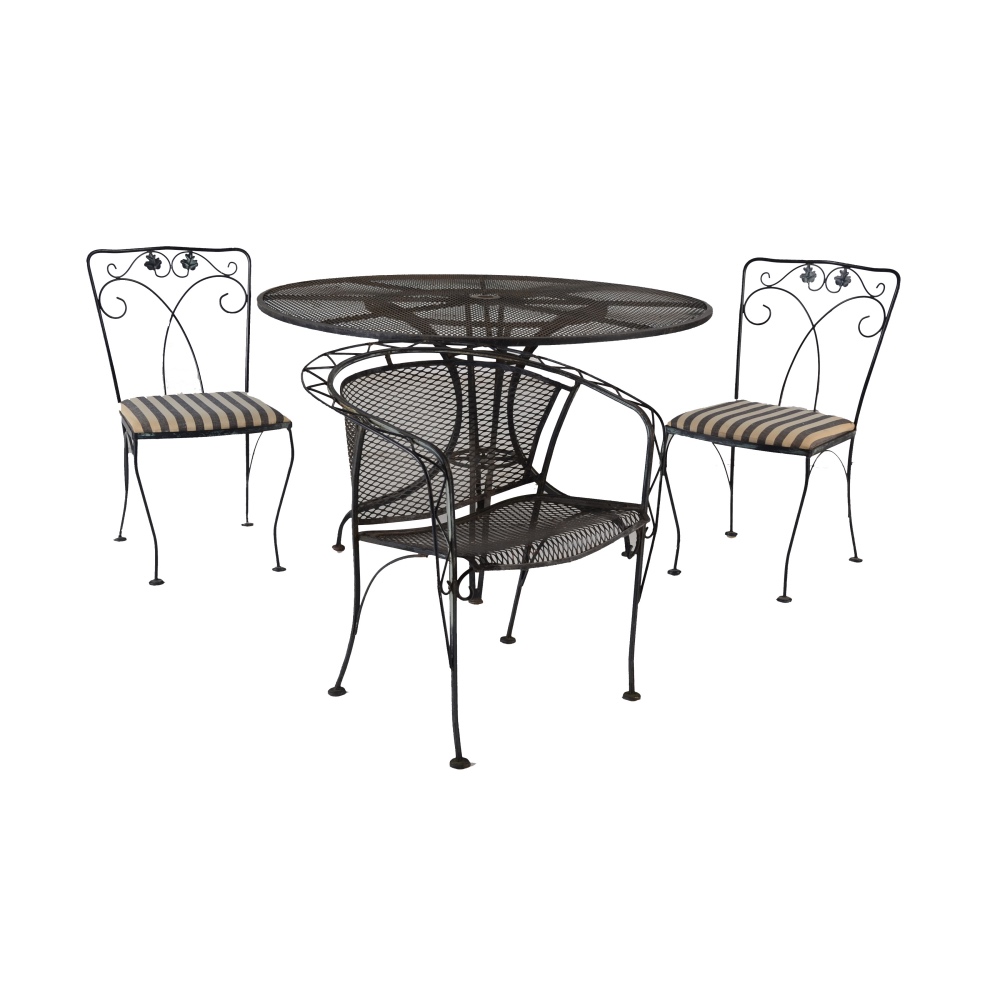 Round Metal Patio Table and Assorted Chairs