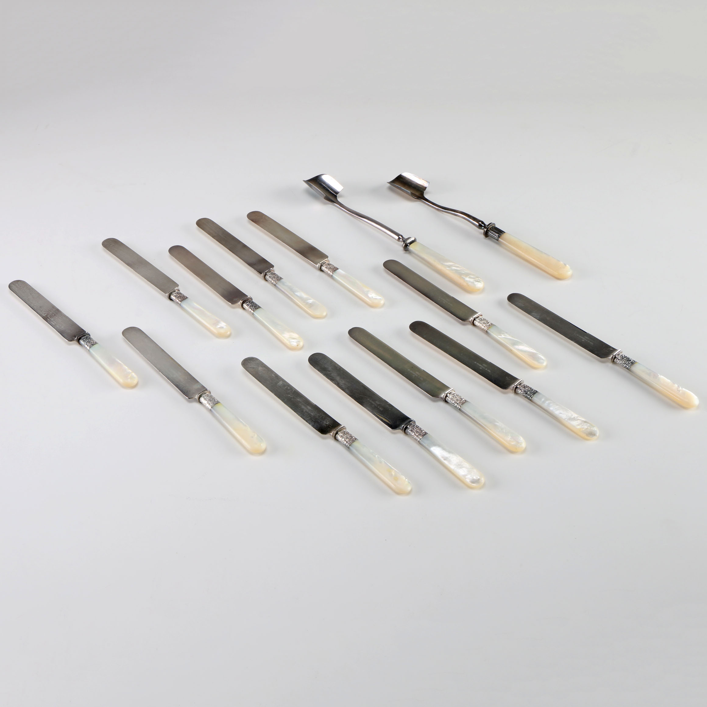 Twelve Vintage Russell & Co. Mother of Pearl Utensils