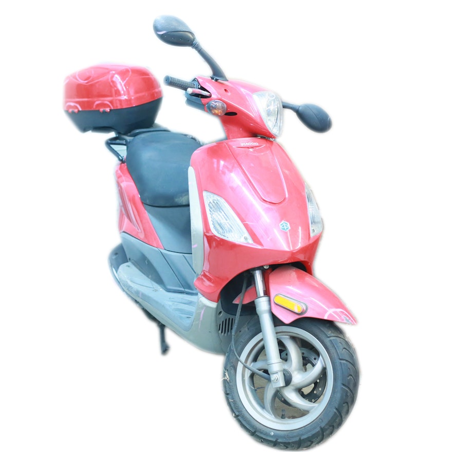 Red Piaggio Fly 50 Scooter with Two Helmets
