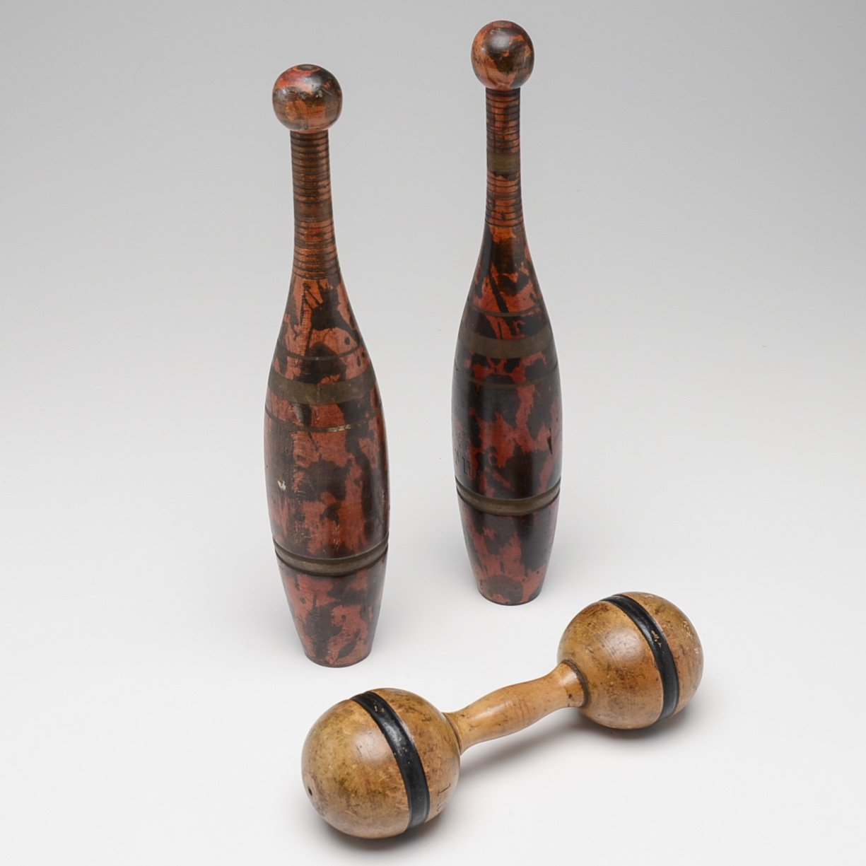 Two Vintage Wooden Juggling Pins and Wooden One Pound Weight