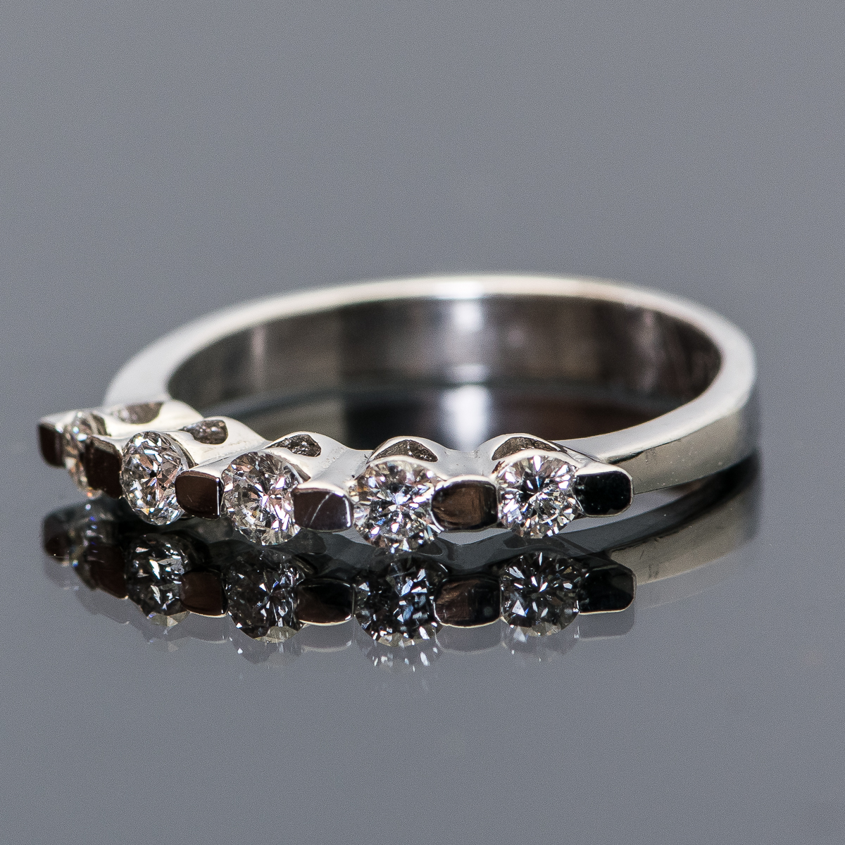 Platinum and Diamond Ring with Heart Cutouts