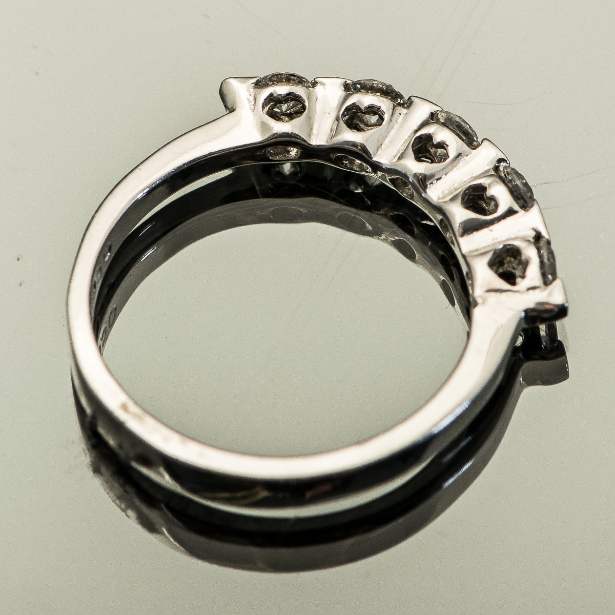 Platinum and Diamond Ring with Heart Cutouts