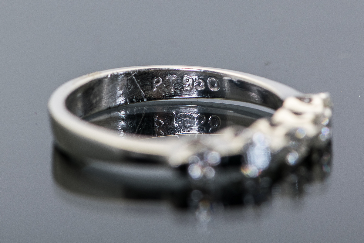 Platinum and Diamond Ring with Heart Cutouts