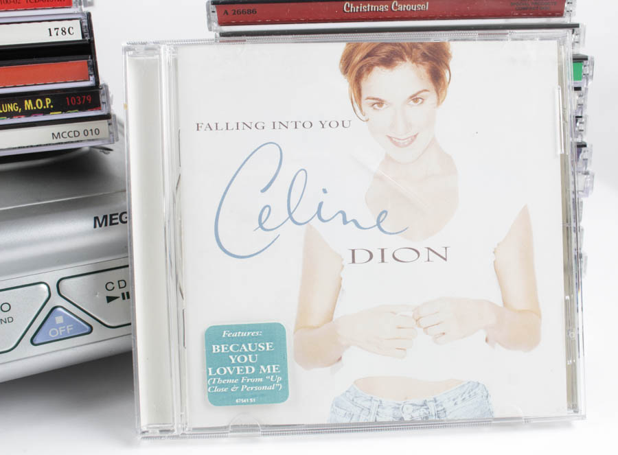 Sony Mega Bass Radio/CD Player and Assortment of CDs