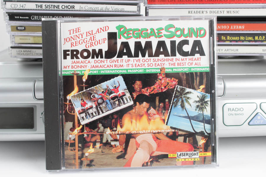 Sony Mega Bass Radio/CD Player and Assortment of CDs